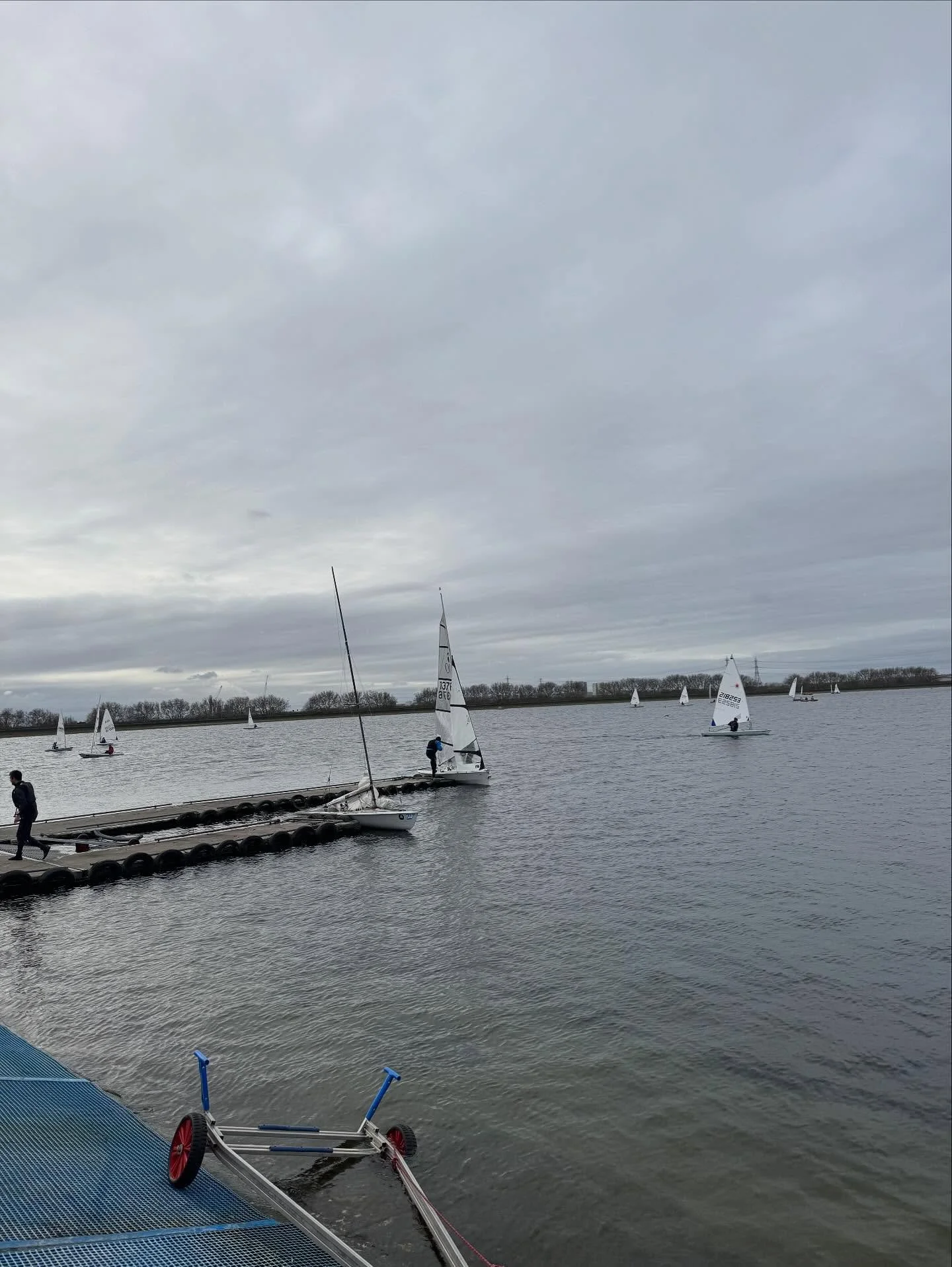 Pursuit Race Sunday, with @gbrcadets in the background training #kgsc #kinggeorgesc #cadet #ilca #contender #rs400 #aero #OK #ilca7 #ilca6 #ilca4 #topper #solo #windy