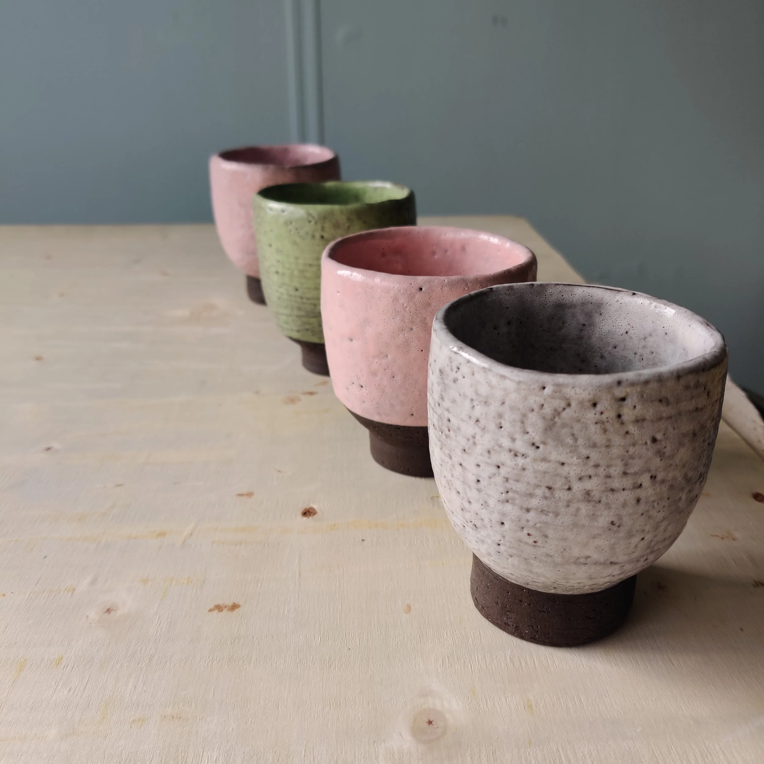 then glazed — pink, sage, speckled white o