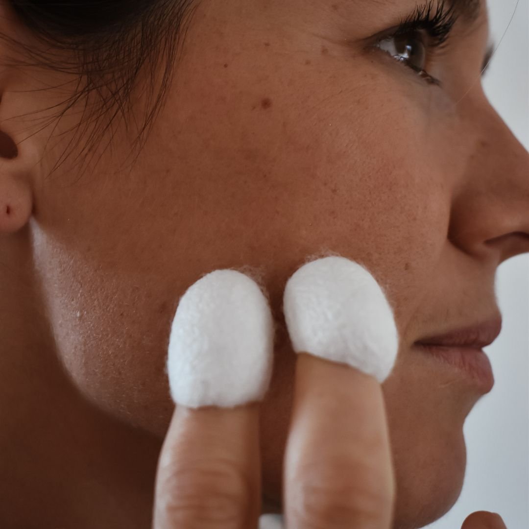 Woman using silk cocoon for her skincare