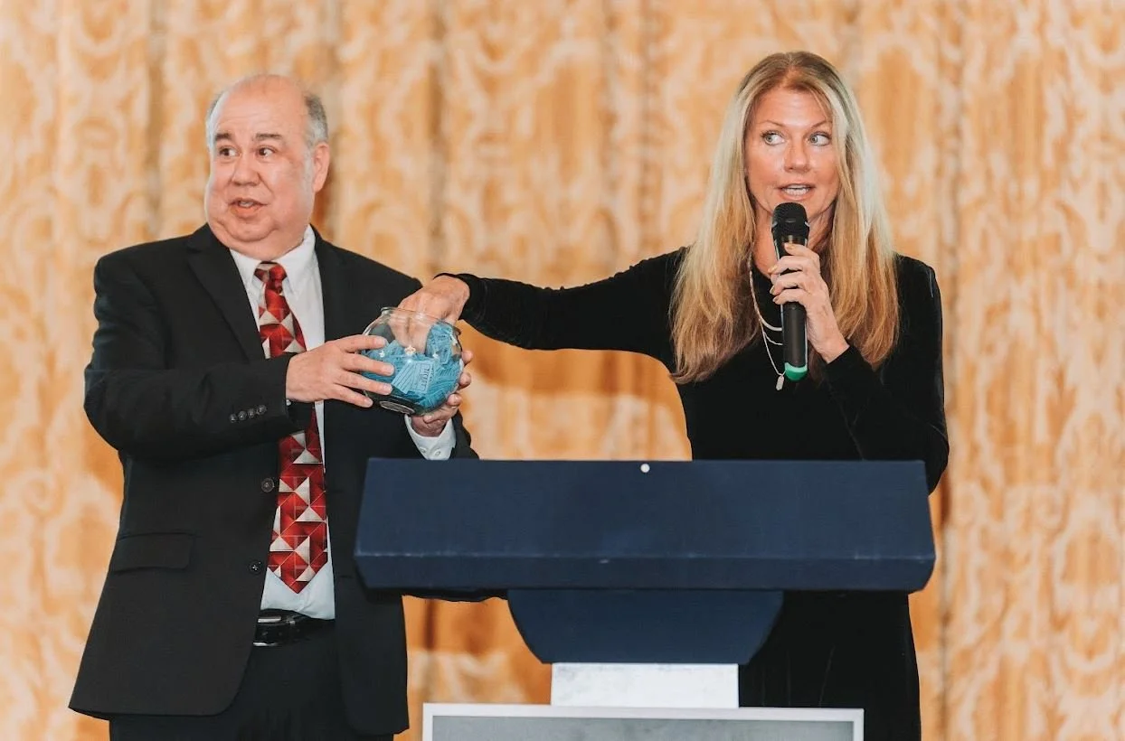 GCLA - 2024 HOLIDAY GALA PIC OF JIM AND SARA RAFFLE.jpg