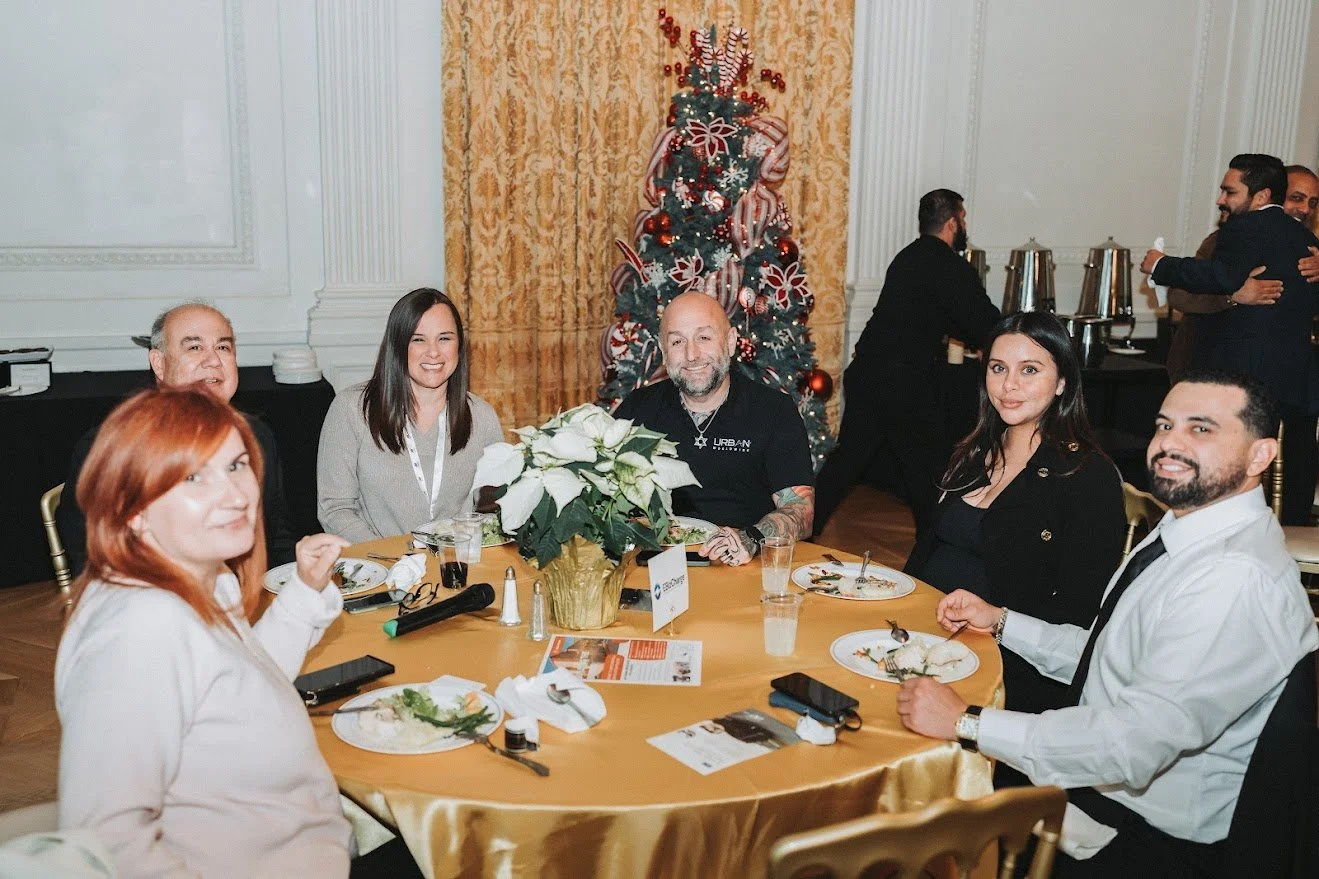 GCLA - 2024 HOLIDAY GALA PIC OF TABLE WITH URBAN.jpg