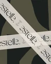 Multiple overlapping panels with text that says 'PLEASE BE GENTLE,' arranged diagonally over an abstract background in shades of black, gray, and olive green.
