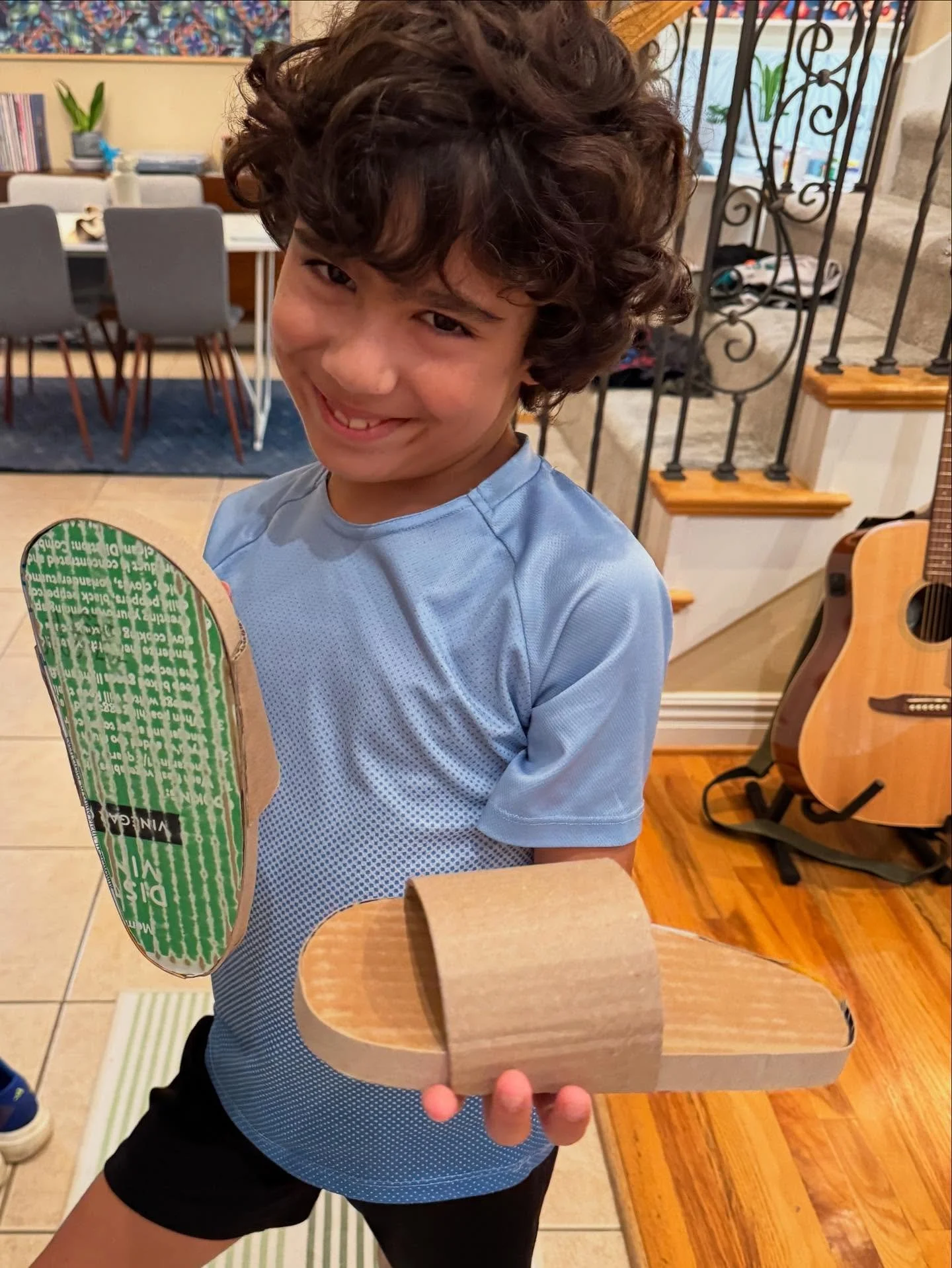 Random kiddo request: Dad-made cardboard slips. Made from white vinegar and saltine boxes, and definitely made only to pose in 😊

#diy #cardboard #cardboardshoes #slips