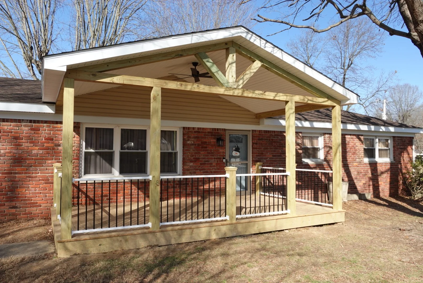 New installation of front porch with open gable 