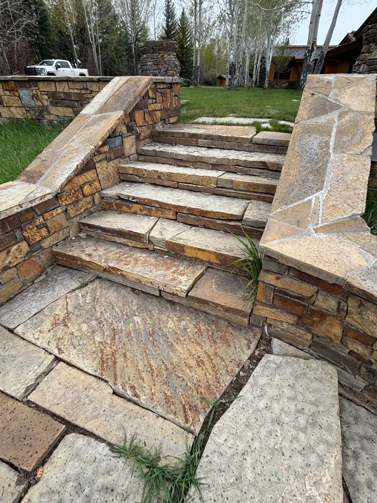 Outdoor Stairway. Bronze patio cap, bronze ledge wall, bronze and sage plates for steps