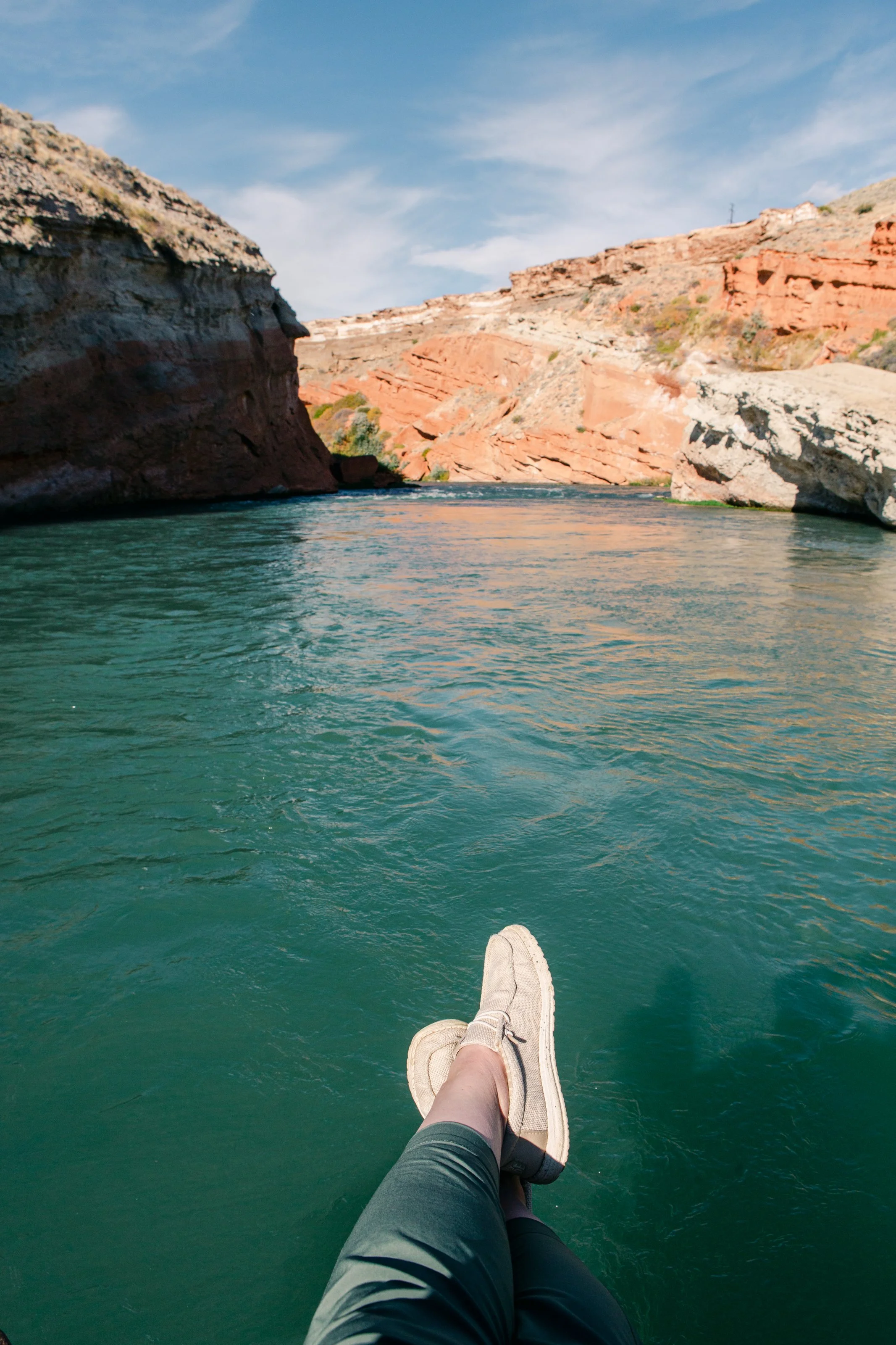Relaxing on a raft while floating a scenic wyoming river Cody wyoming