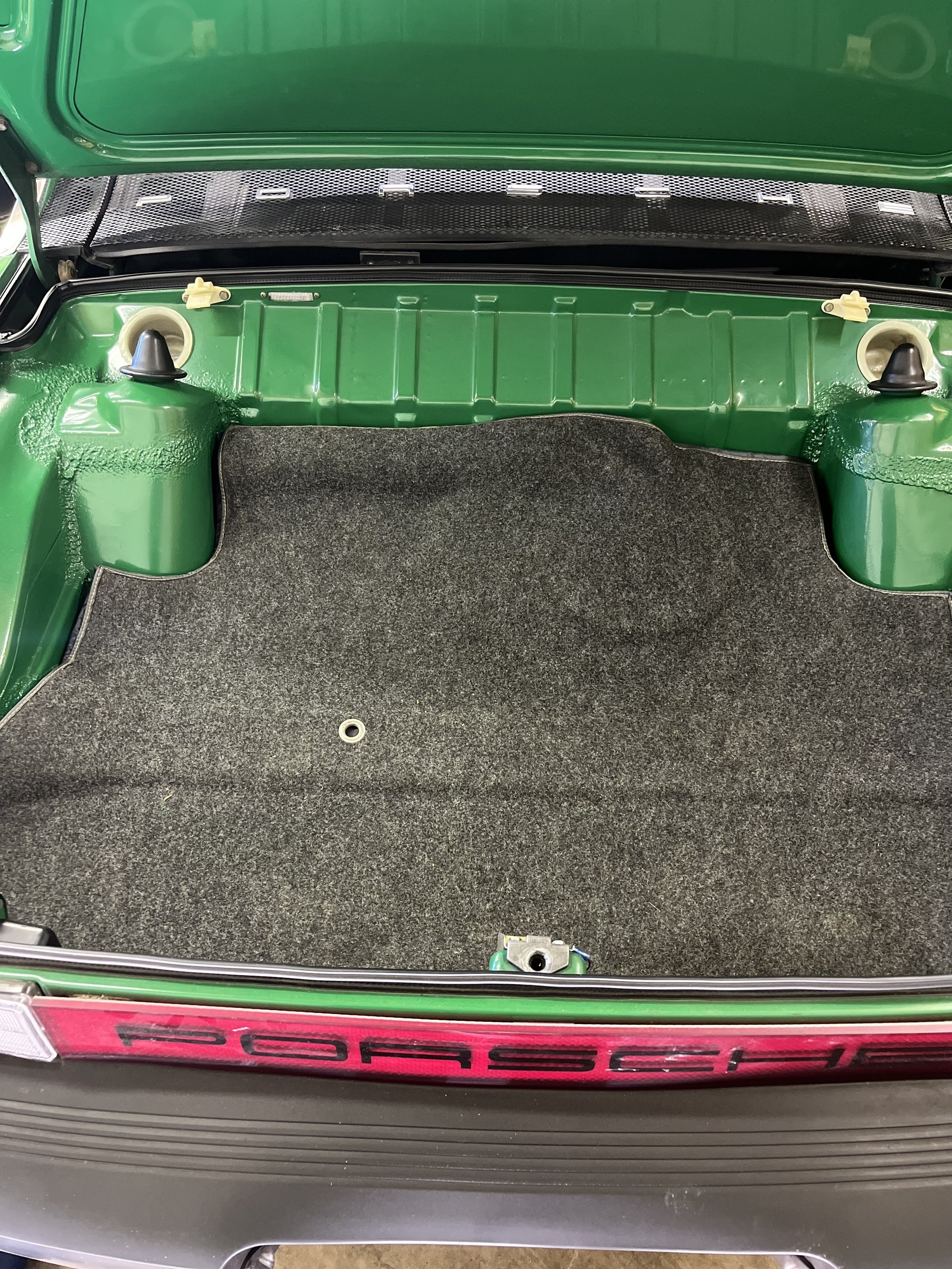 Full rear cargo space retained, 2 more Tesla modules in engine bay.