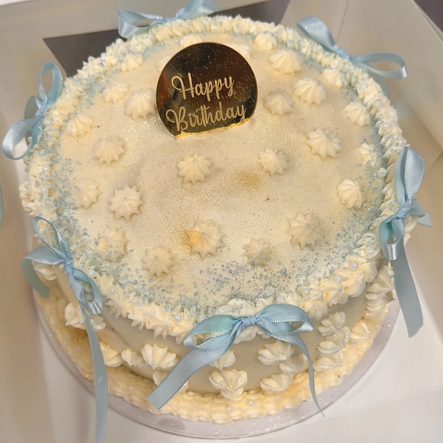 1st birthday cake and mini cupcakes to celebrate. 

Clients order: 
8&rdquo; round came - Blue velvet cake with Chantilly center, covered with our new delicious vanilla bean butter cream. 

3 dozen - Mini blue velvety cupcakes with vanilla bean butte