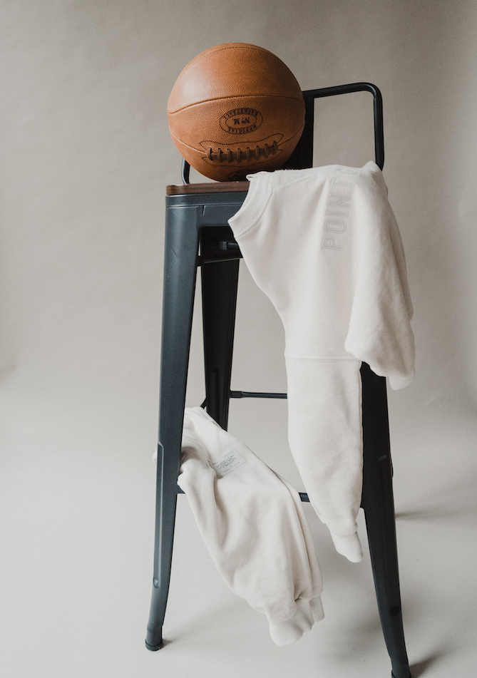 positionless by Kristen Ledlow is inspired by her love of basketball and professional career with the NBA created by creative agency BTS Group founder Ryan McGrath. Vintage varsity gender neutral kids streetwear organic cotton hoodies, t shirts sweat
