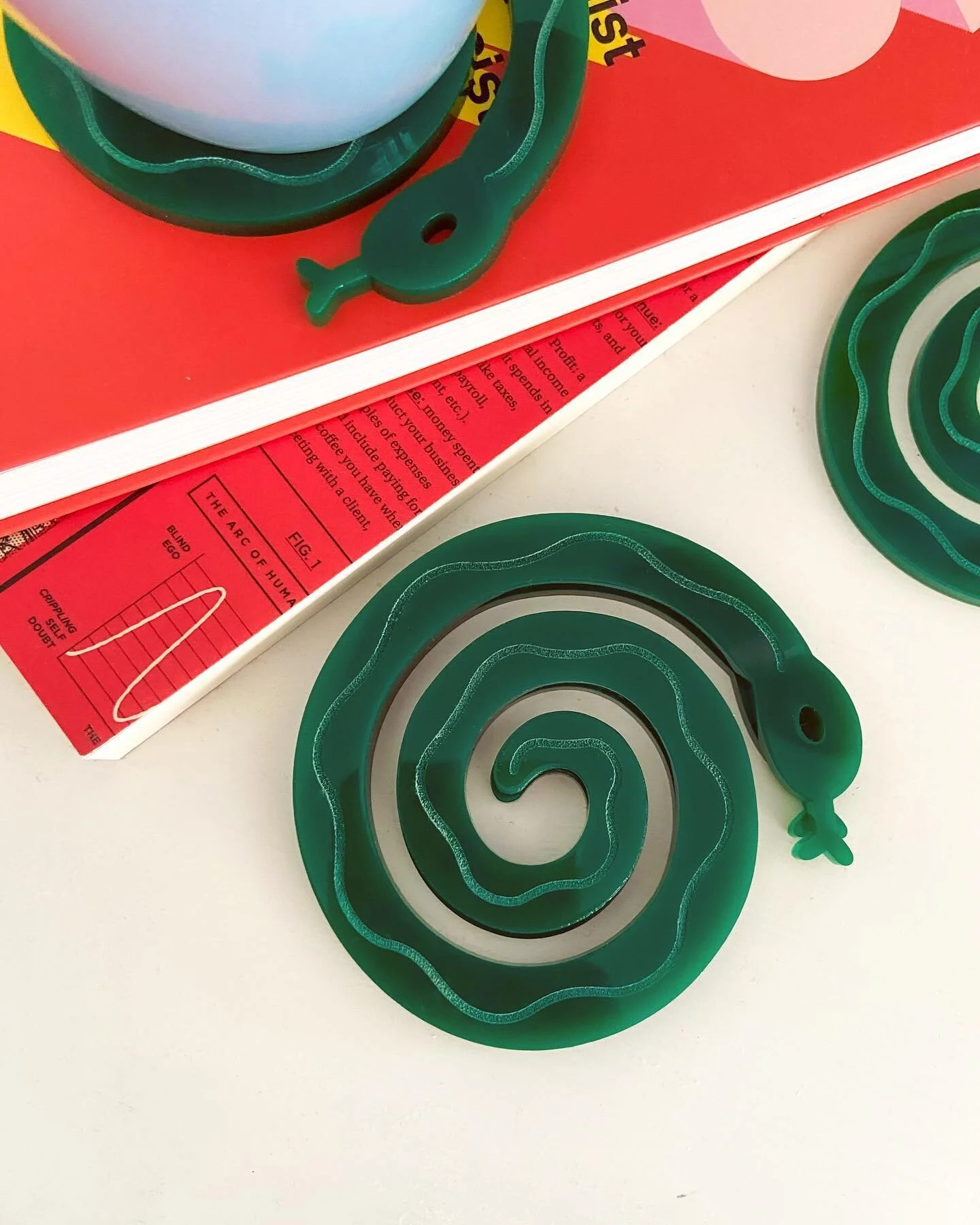 Some funky snake coasters to keep your coffee table lookin right. Currently looking into setting up an online shop, but until then you can dm me if you&rsquo;re interested in buying a set for yourself (or a friend with good taste). 
*
*
*
#art #paint