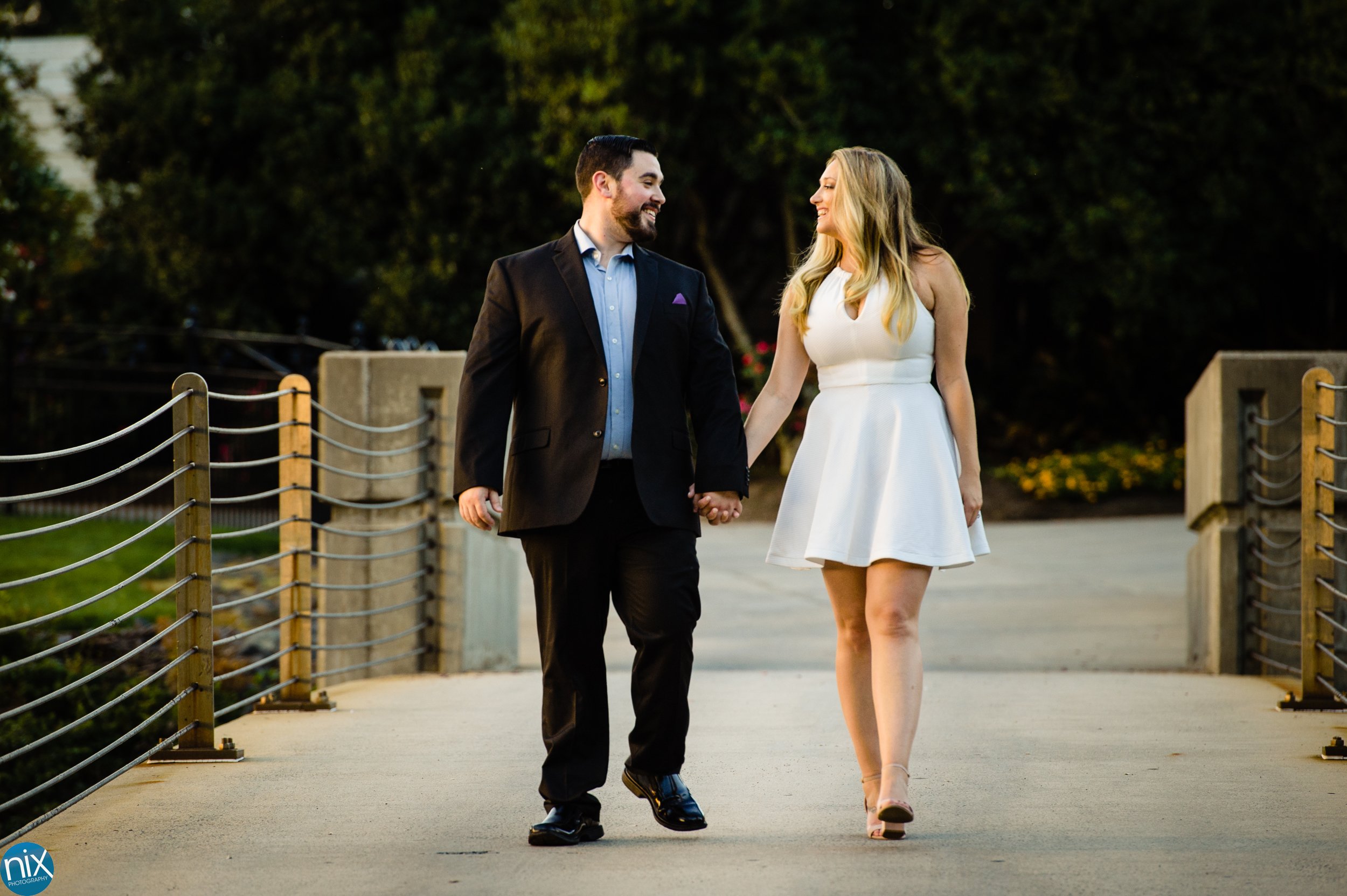 charlotte_engagement_photographer_couple_walks.jpg