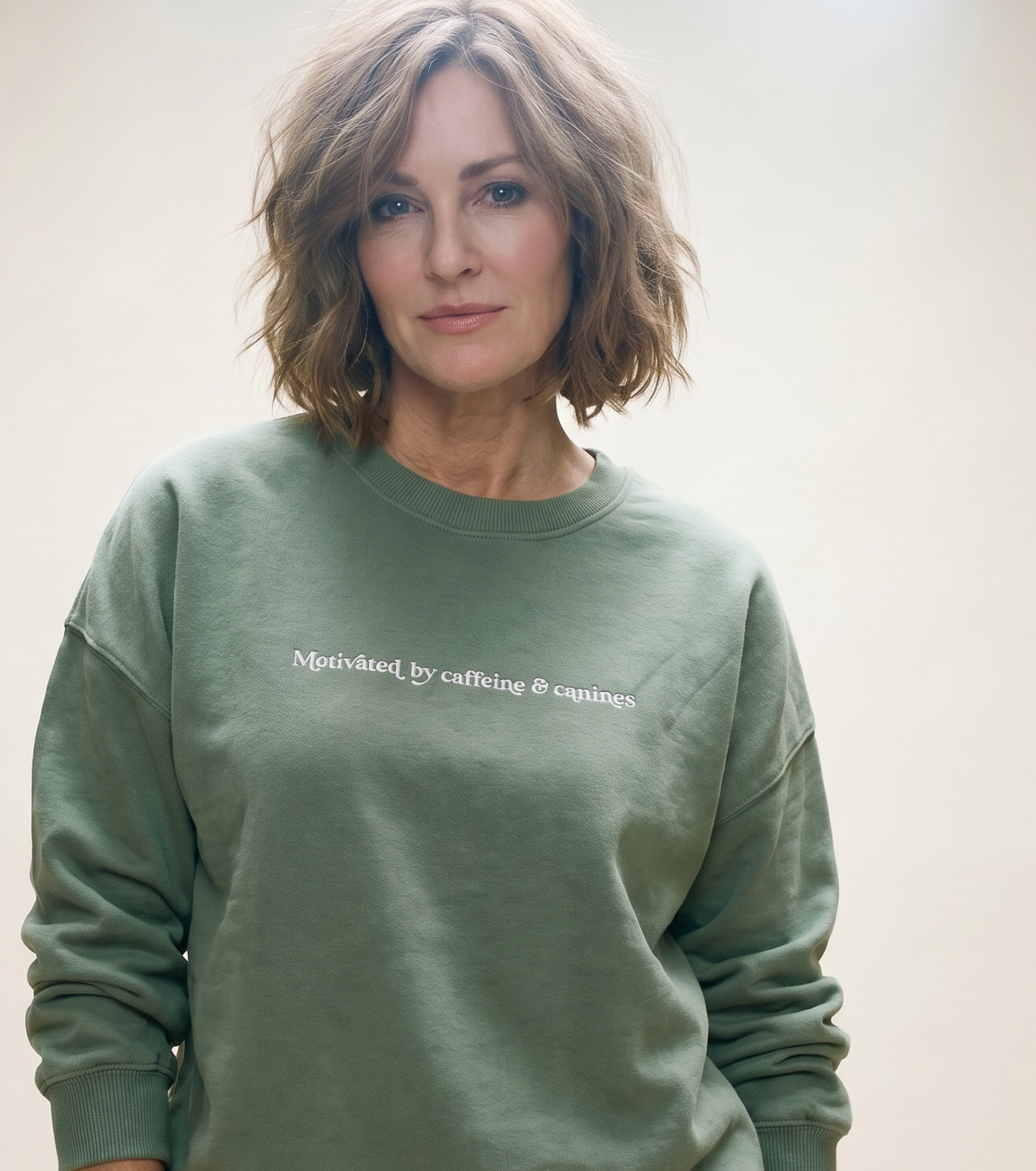 Motivated By Sweatshirt in Sage.png