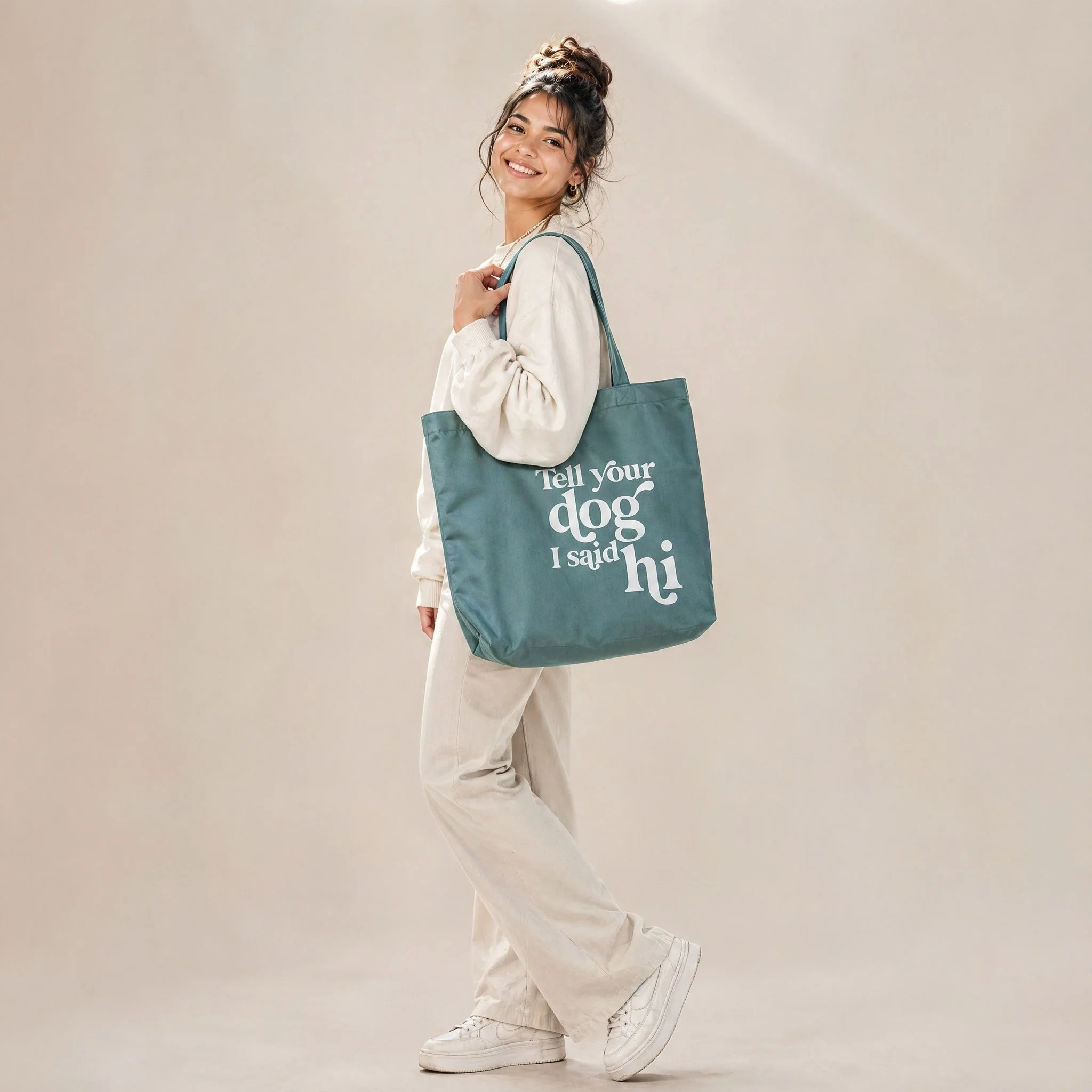 Tell Your Dog Hi Tote in Sage on Model.jpg