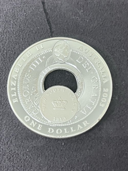 Holey dollar.jpeg