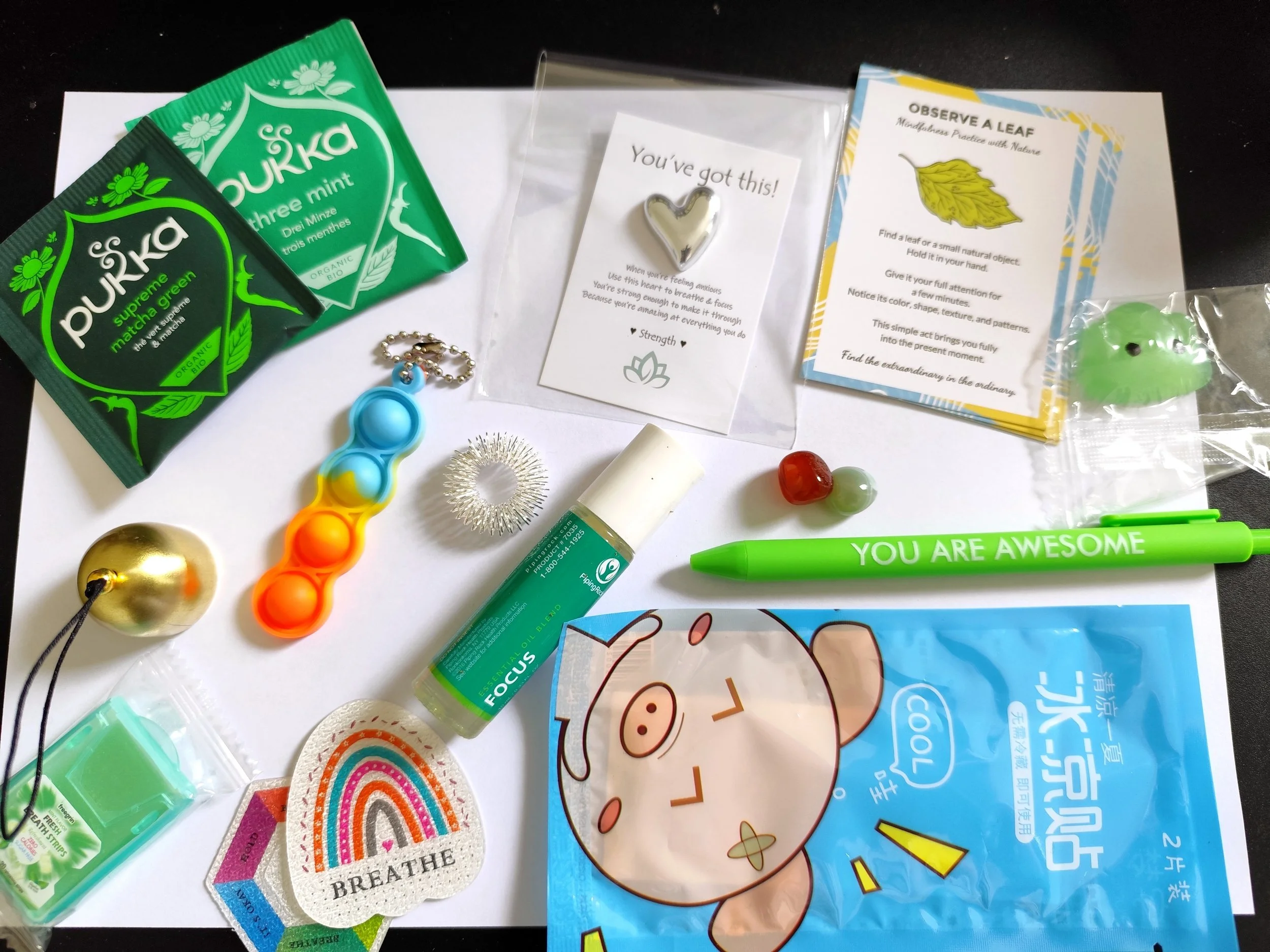 The Alerting Sensory Rescue Kit contains items designed to stimulate the senses and ground us in times of numbness or dissociation.