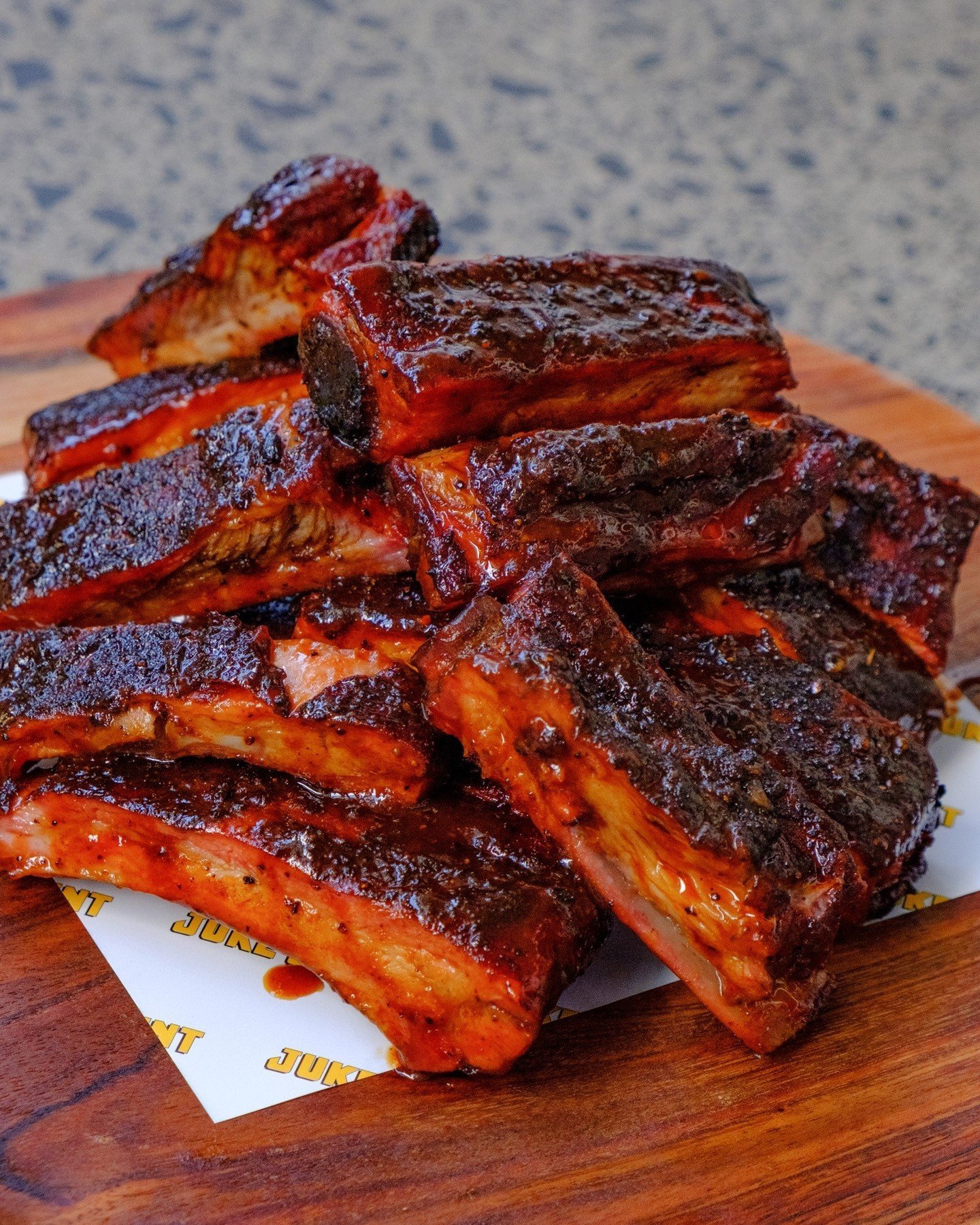 Premium US pork ribs, hot smoked over wood for 6 hours, seasoned with Juke's house spice rub and tossed in your choice of Juke's BBQ, Spicy BBQ or buffalo hot sauce 🐷⁠
⁠
Available in 400gm or 800gm servings, great for sharing.