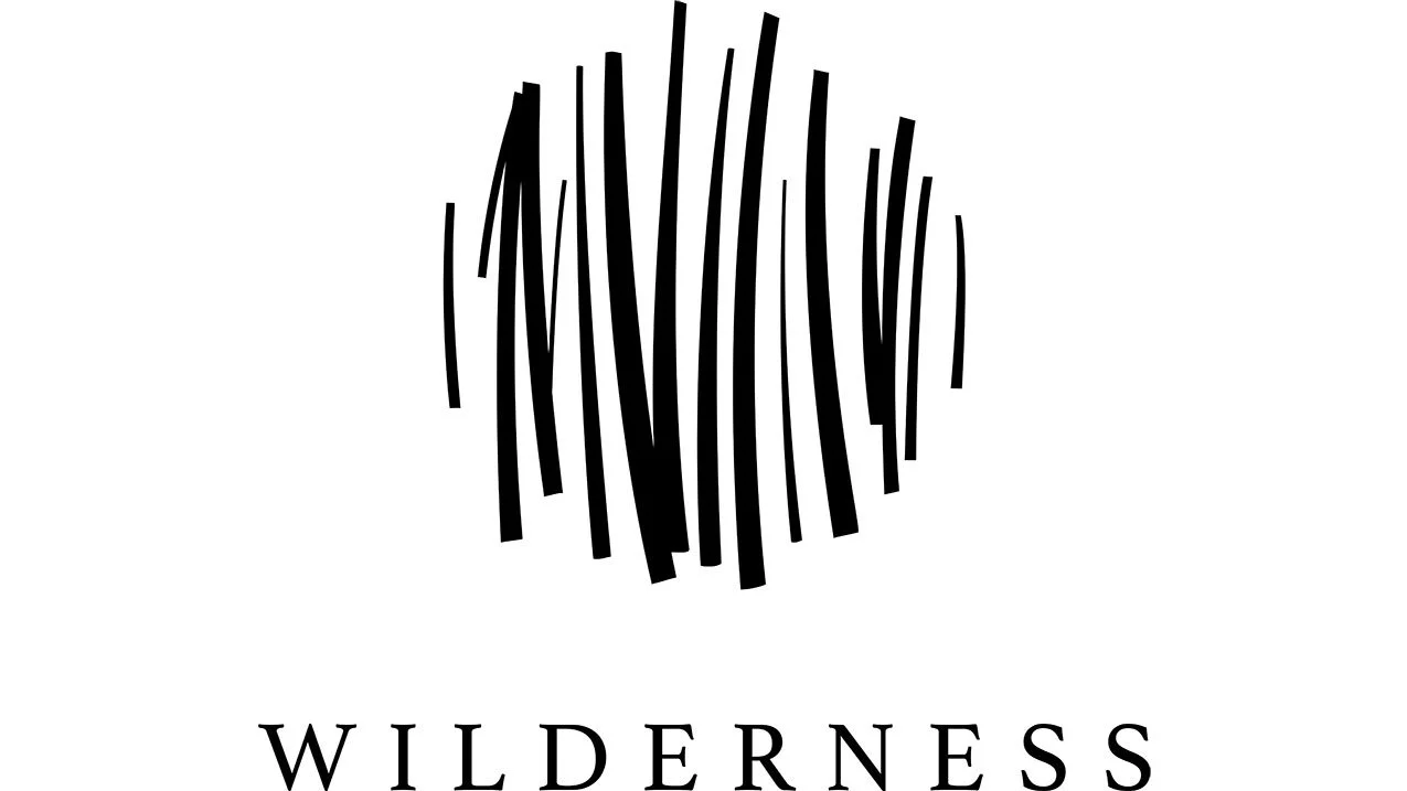 wildernessprimarylogoblackwithexlusion-cmyk-jpg.jpg