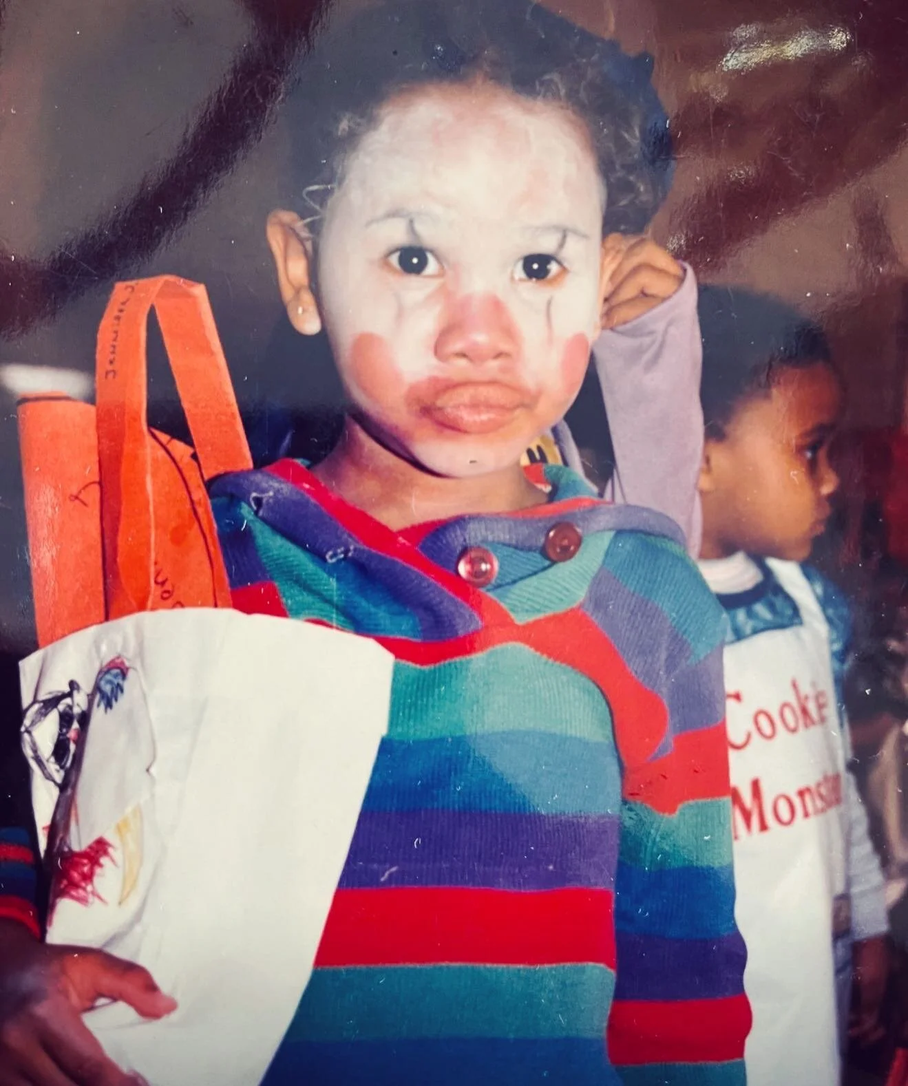 A story of Halloween past. Baby Jen was unimpressed with her wig and refused to wear it. Because Baby Jen is no clown. The end.