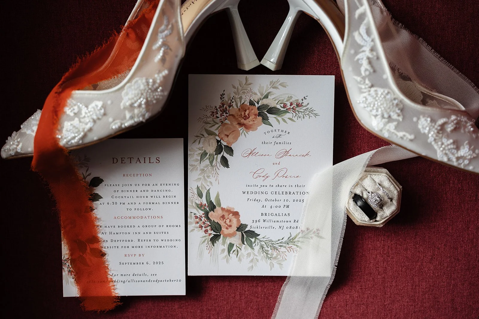 Layflat details Photos with brides heels, rings, and invitations at Holiday Inn in Deptford, PA. 
