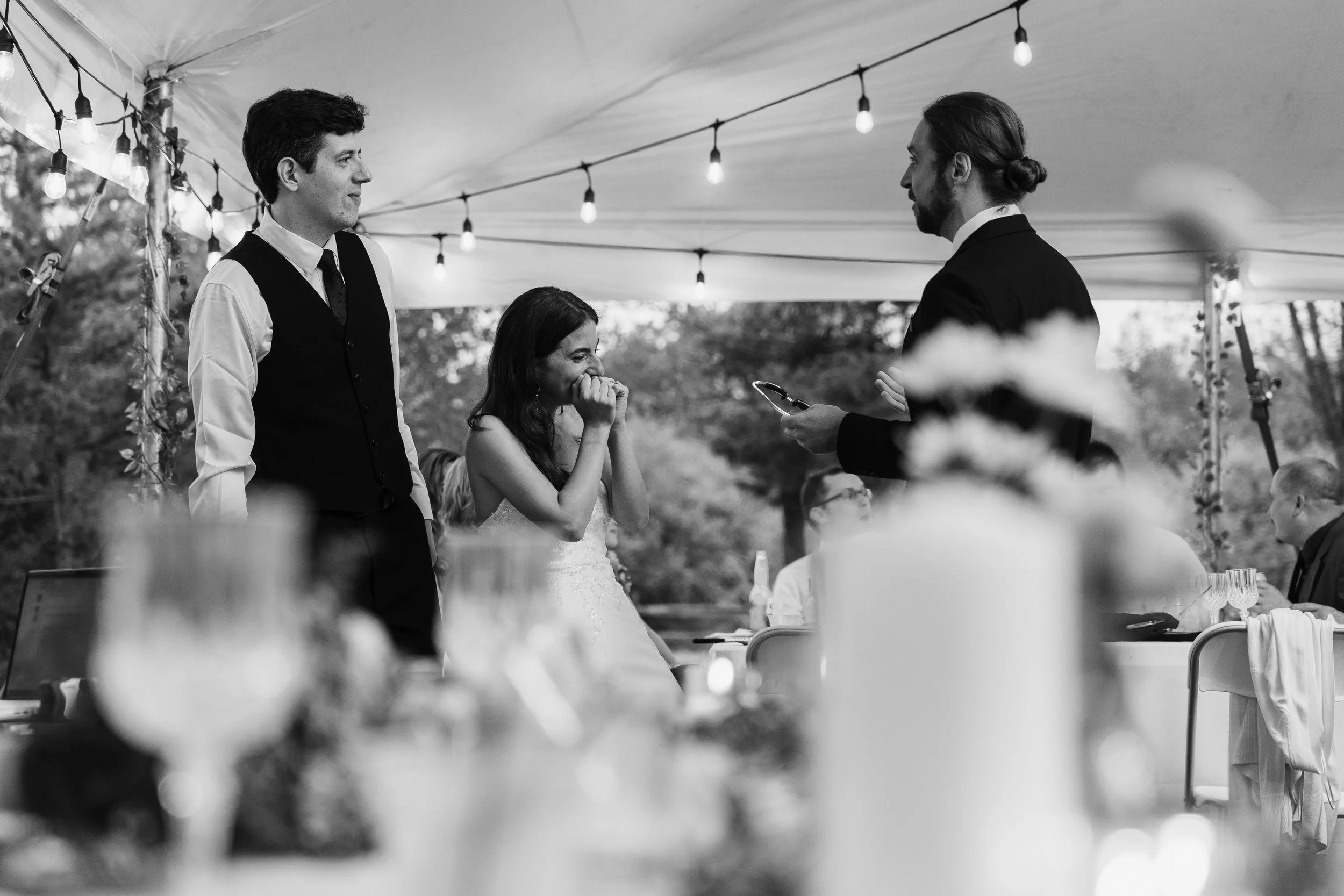 Bride showing excitement during wedding reception at backyard wedding in New Field New Jersey