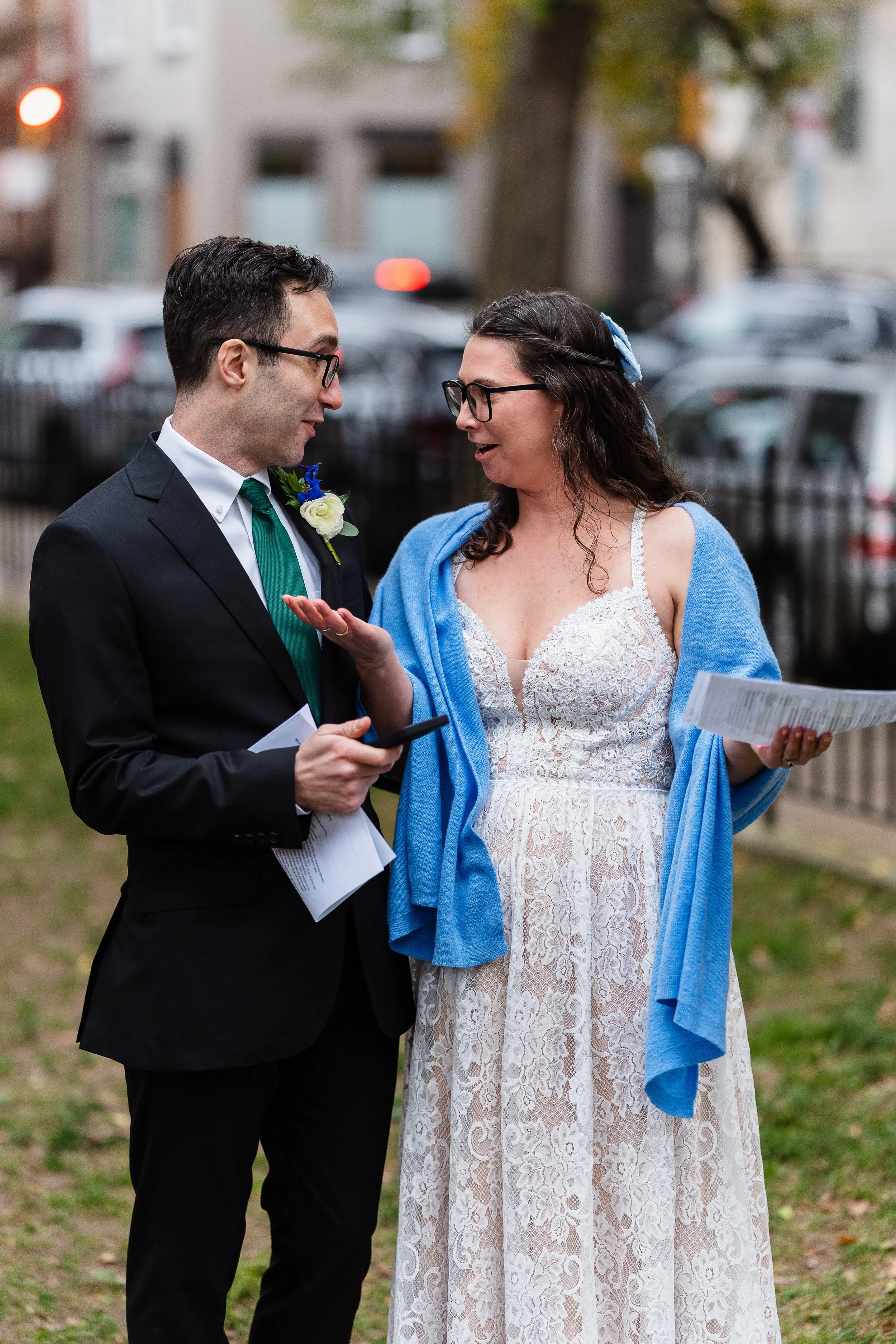 Bride and Groom looking at each other during Self-Uniting Ceremony at Fitler Square in Philadelphia, PA. 