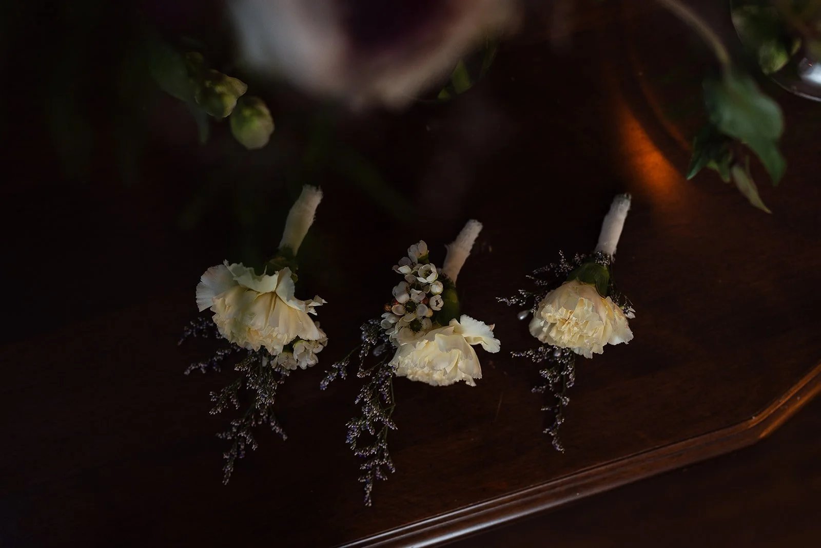 Grooms lapel flowers detail photo at Vaux Studio in Philadelphia, PA. 
