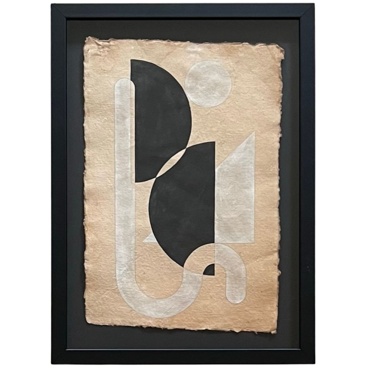 Geometric painting with black and white watercolour pigment on fine tea stained cotton rag with a deckle edge