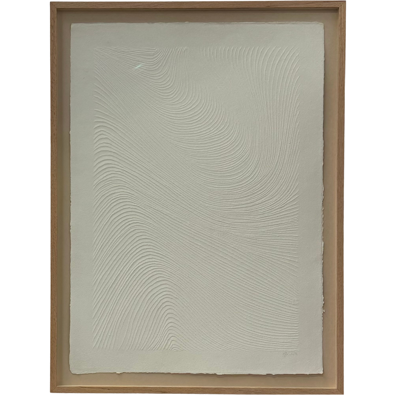 all white carving has a sweeping flow pattern.