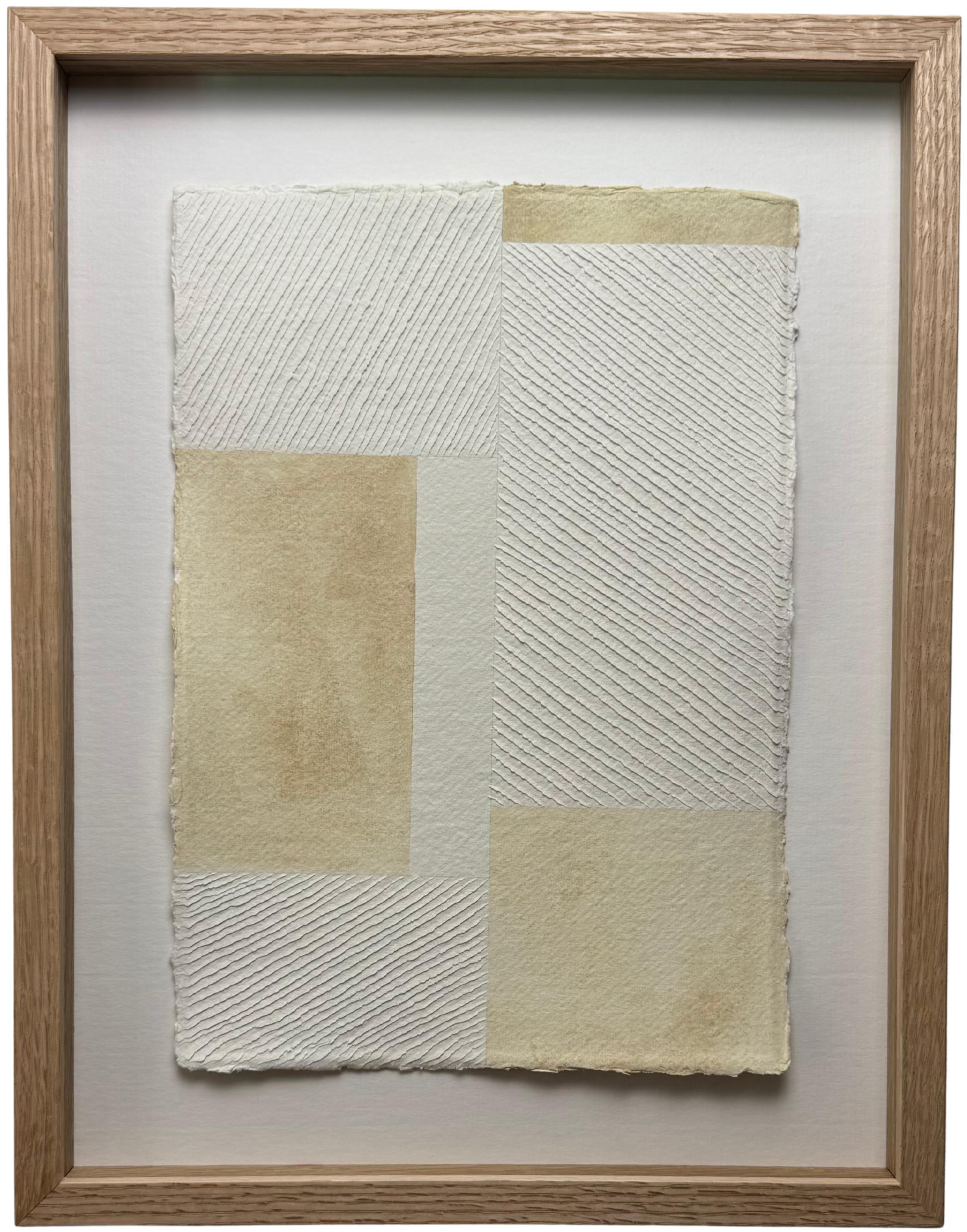 white and buff colour textural artwork on paper with carvings in a geometric block formation inspired by the work of Piet Mondrian. Framed in Oak with ArtGlass