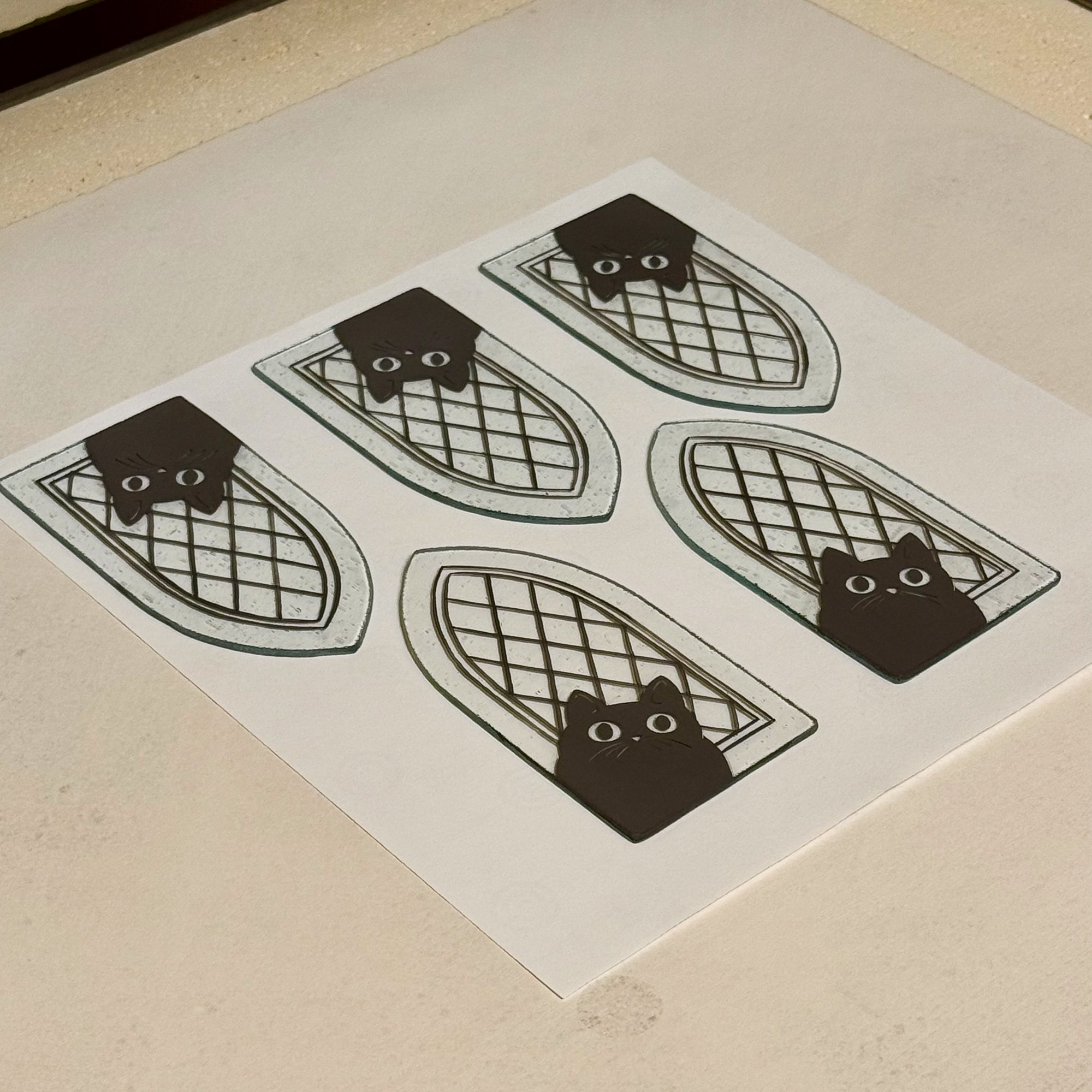 Hand painted glass pieces in the kiln after firing