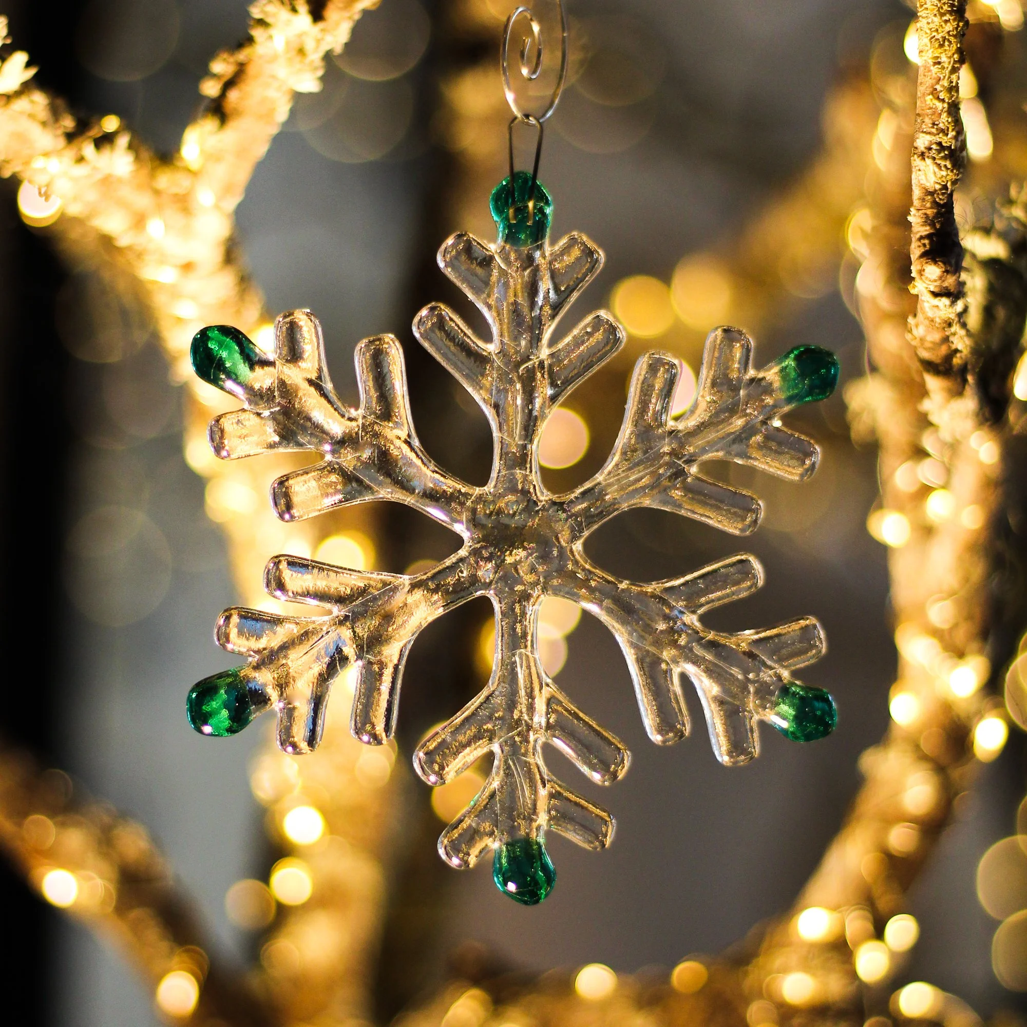 Fused glass snowflake with teal coloured tips