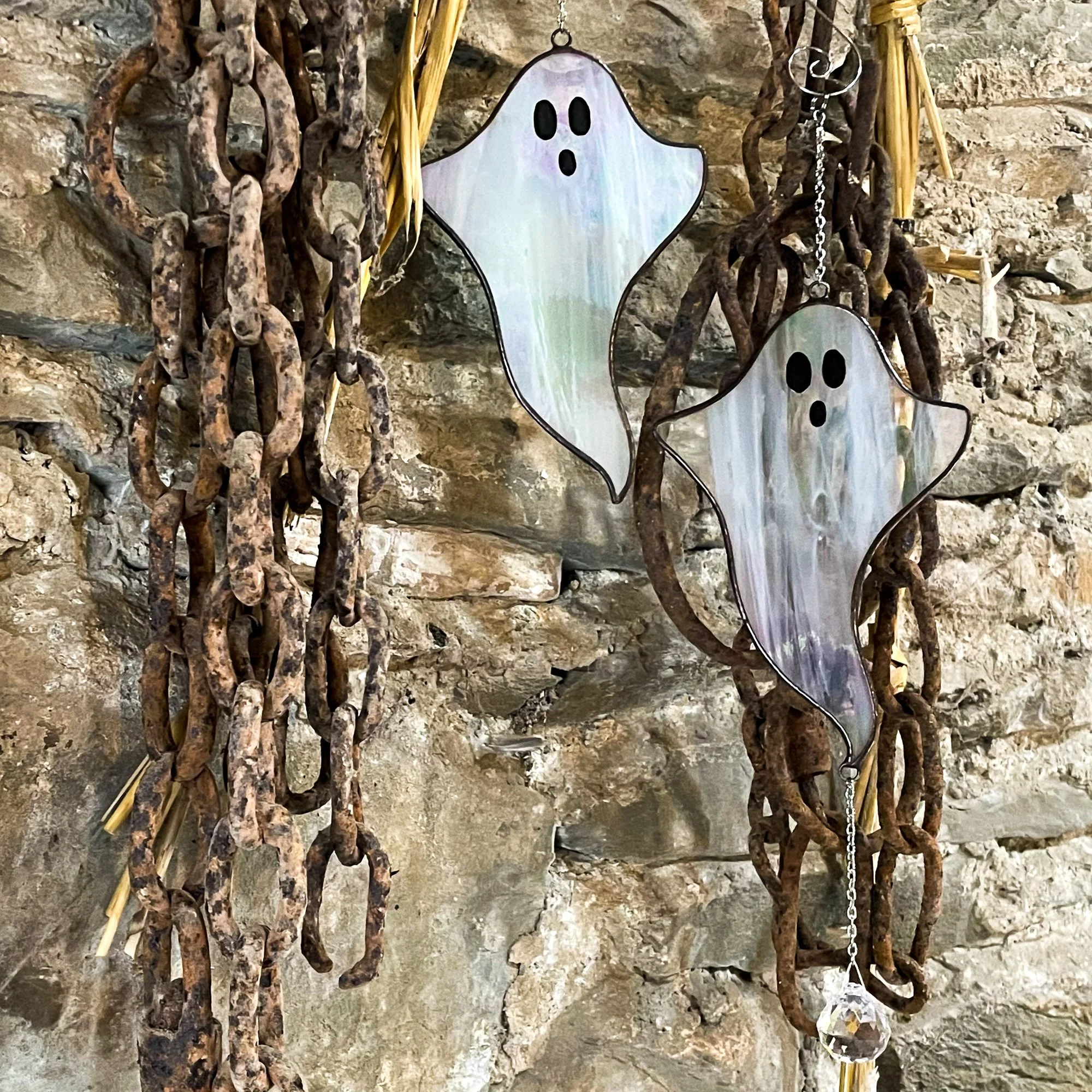 2 stained glass ghosts made from streaky irridescent glass
