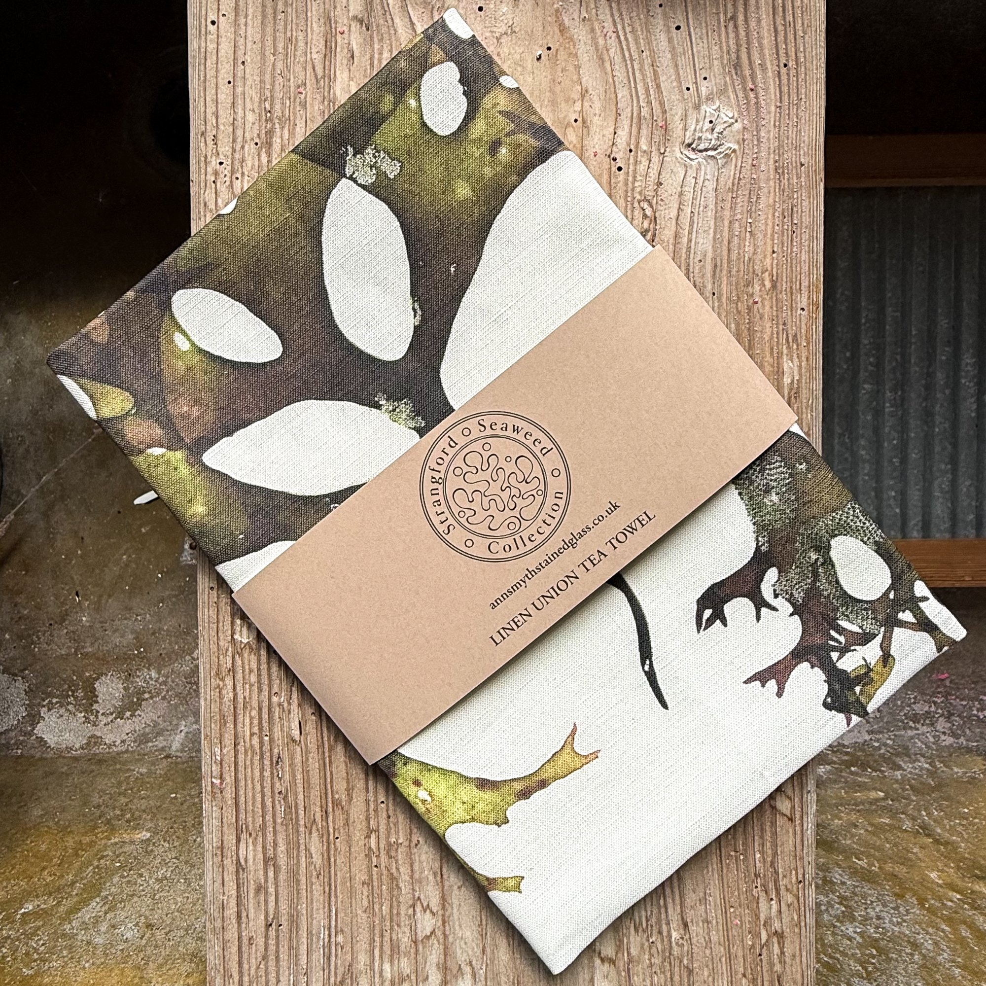 Strangford seaweed collection tea towel folded with branded wrap