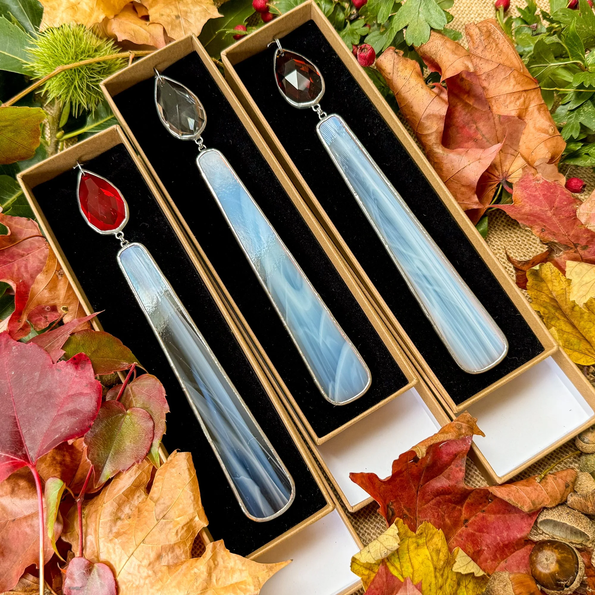 3 stained glass candles with coloured crystal flames presented in luxury kraft gift boxes