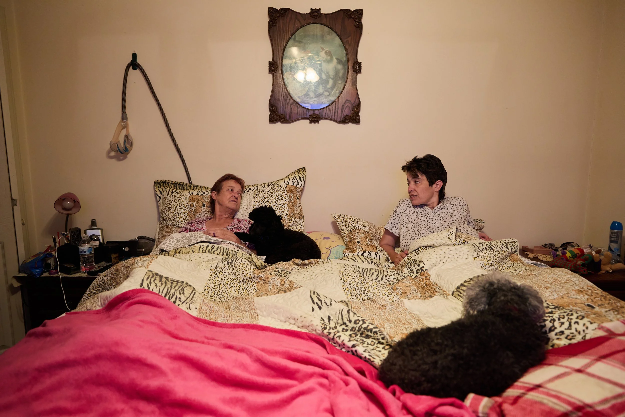 Cindy West Rigsbee, 67, and her daughter Beth, 46, share a quiet moment before bed at their home in Durham, N.C., on July 26, 2023. Cindy's role as both mother and caregiver to Beth, who lives with a severe form of epilepsy, was suddenly upended in J