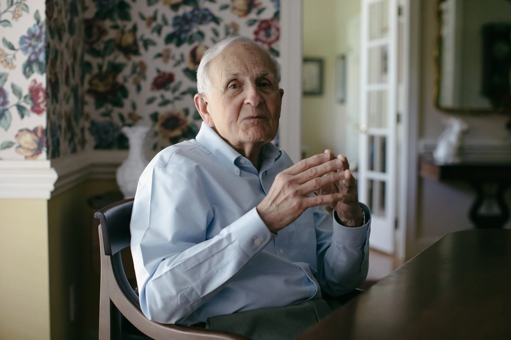 Austin Connors, my grandfather, poses for a portrait in his dining room in Raleigh, N.C. on April 21, 2022, months before moving into a retirement home.