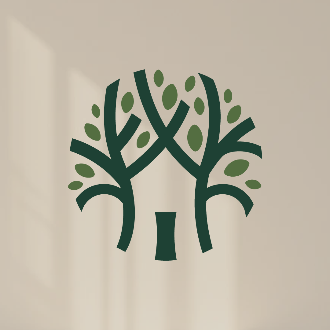 Simple stylized logo of a tree with a dark green trunk, branches, and green leaves on a beige wall.