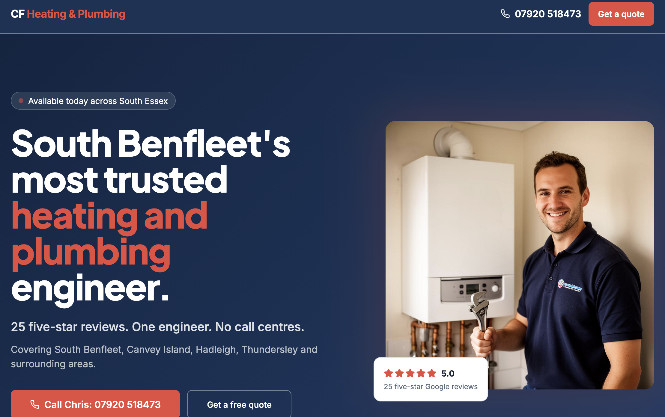 A man in a navy polo shirt holding a silver wrench standing next to a wall-mounted boiler or heating system in a home or service setting.