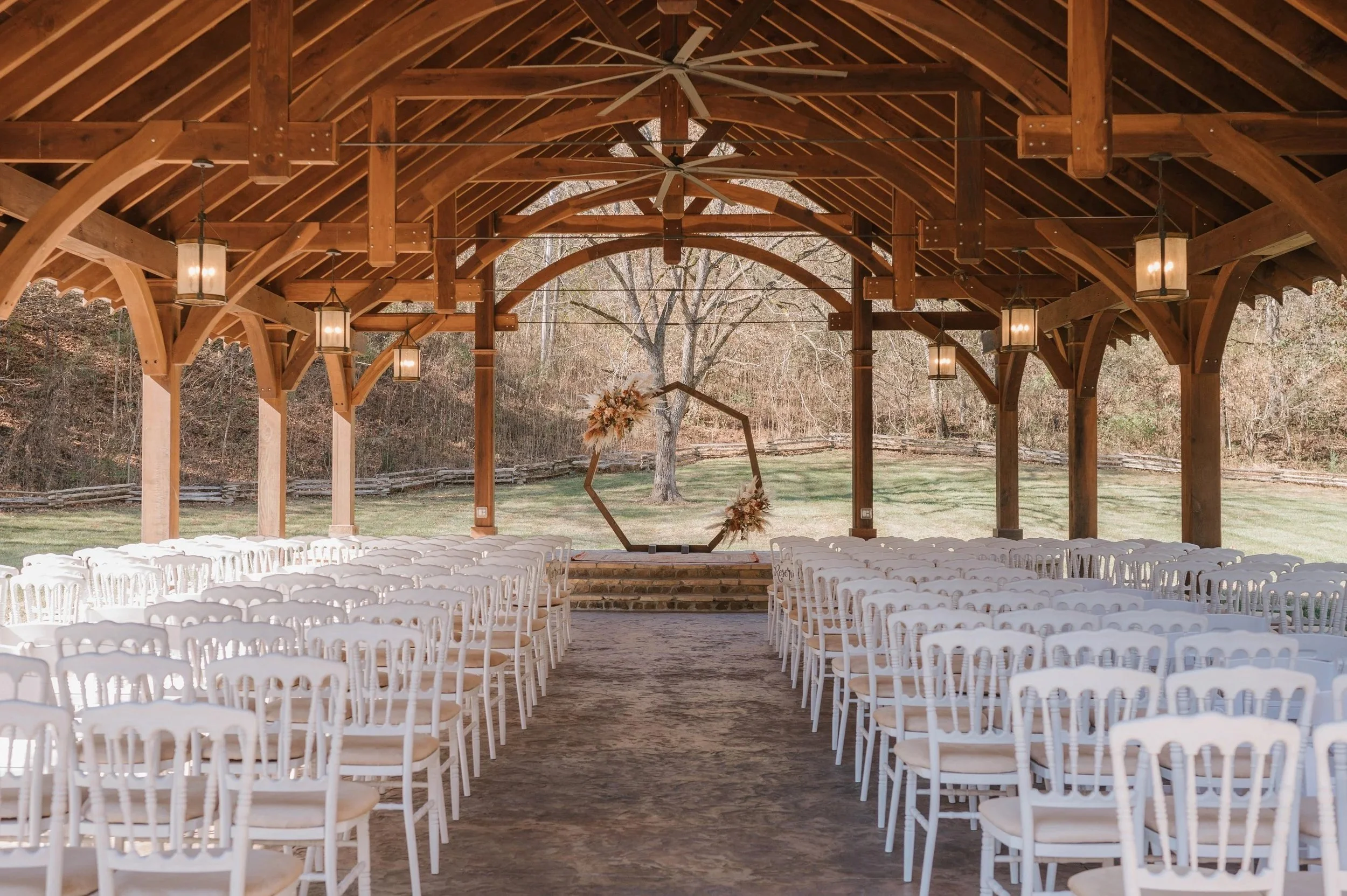 Smoky Mountain wedding venue ceremony space at Leather Bound Hollow in Sevierville TN with open-air pavilion seating.