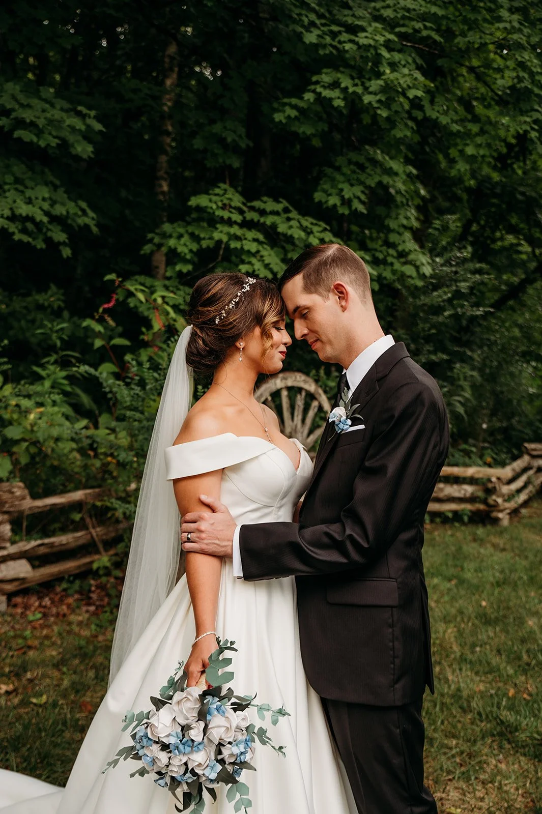 Romantic Smoky Mountain elopement couple portrait in East Tennessee surrounded by natural forest scenery and intimate wedding atmosphere.