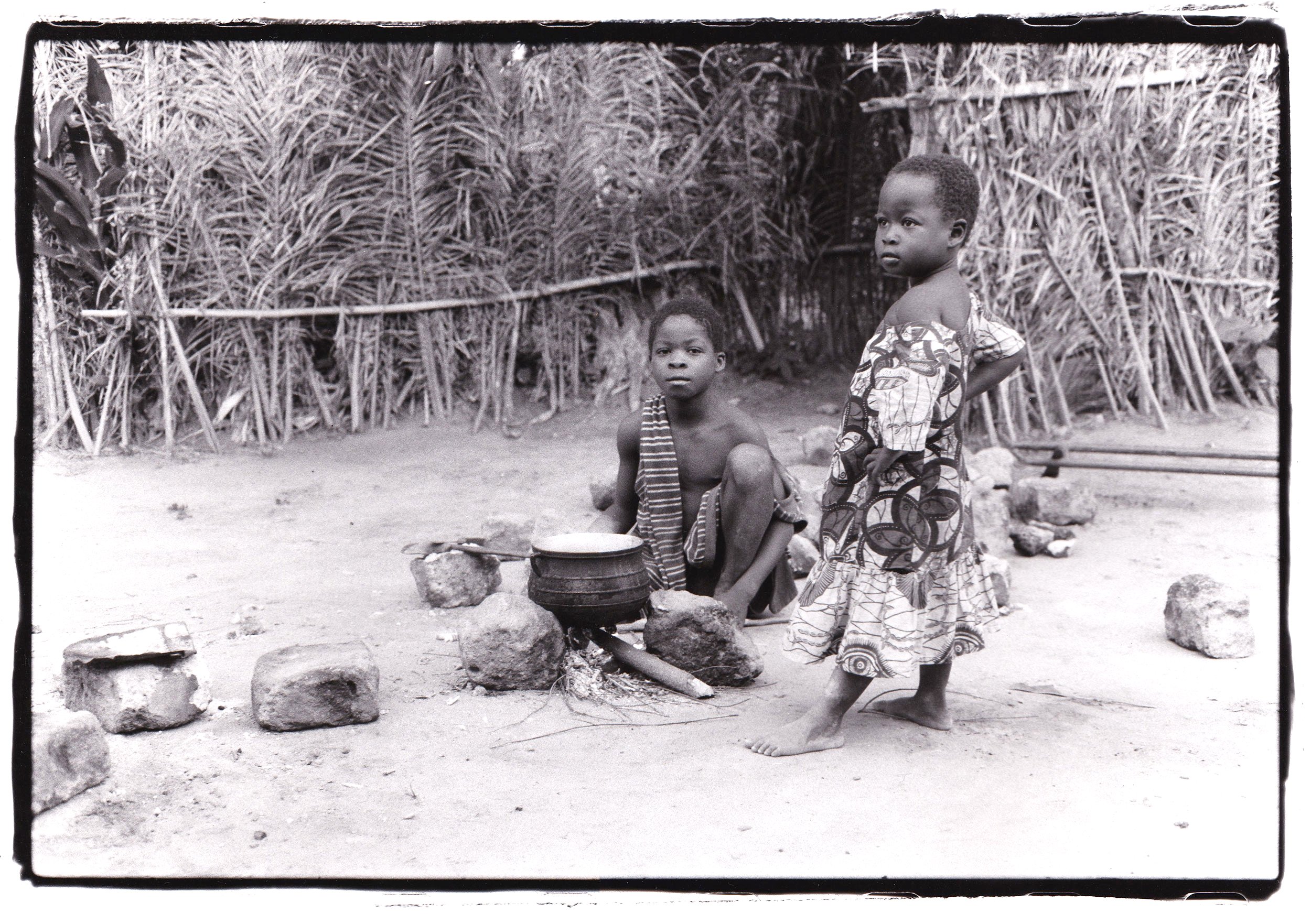 Kids cooking on shrine night. Dagbamate, Upper Volta region, Ghana, 2002 (Canon AE-1)