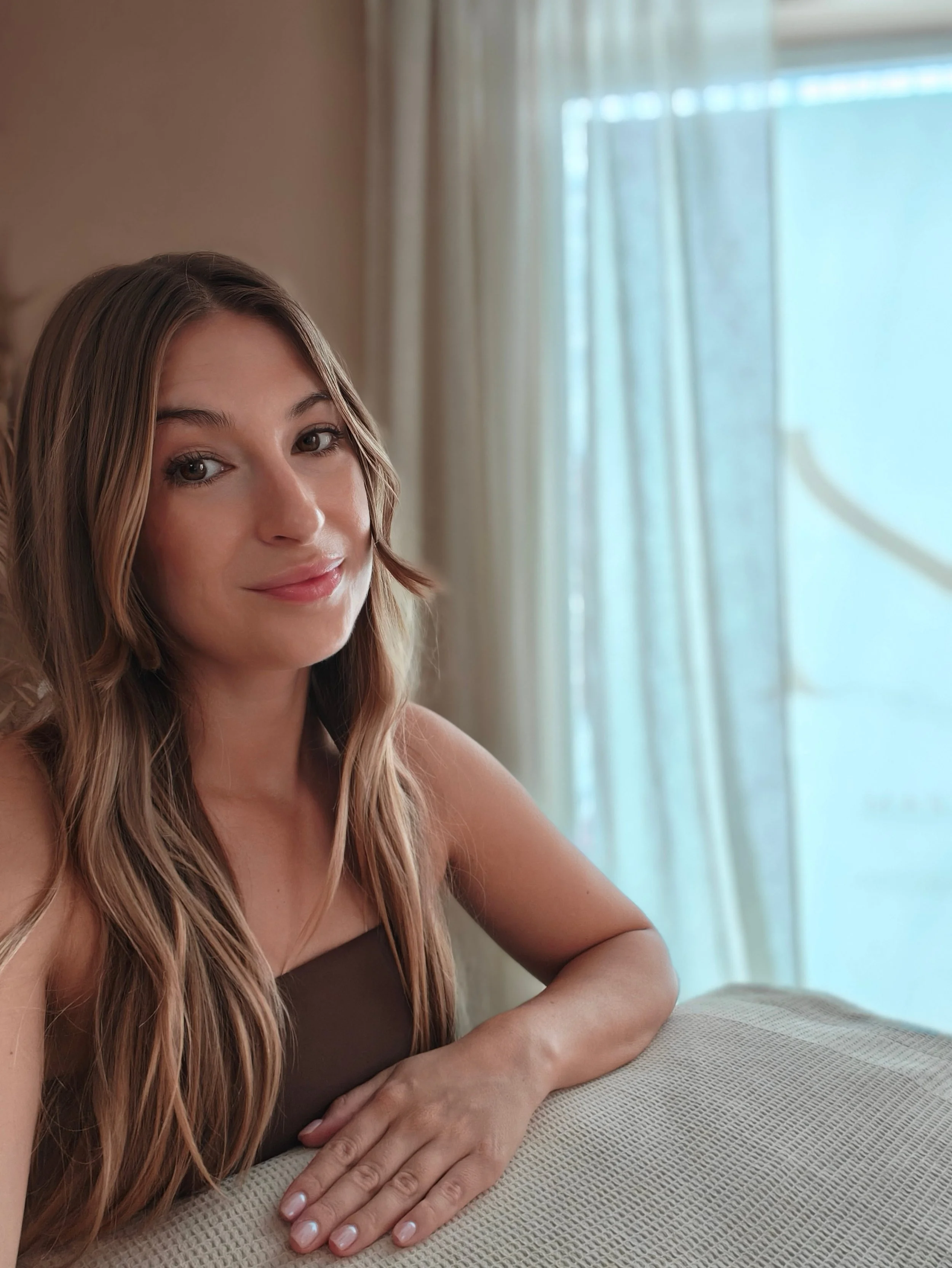 The founder of Naós Somatic Sanctuary in Kardamena, a certified specialist in Vagus nerve therapy and intuitive bodywork rituals.