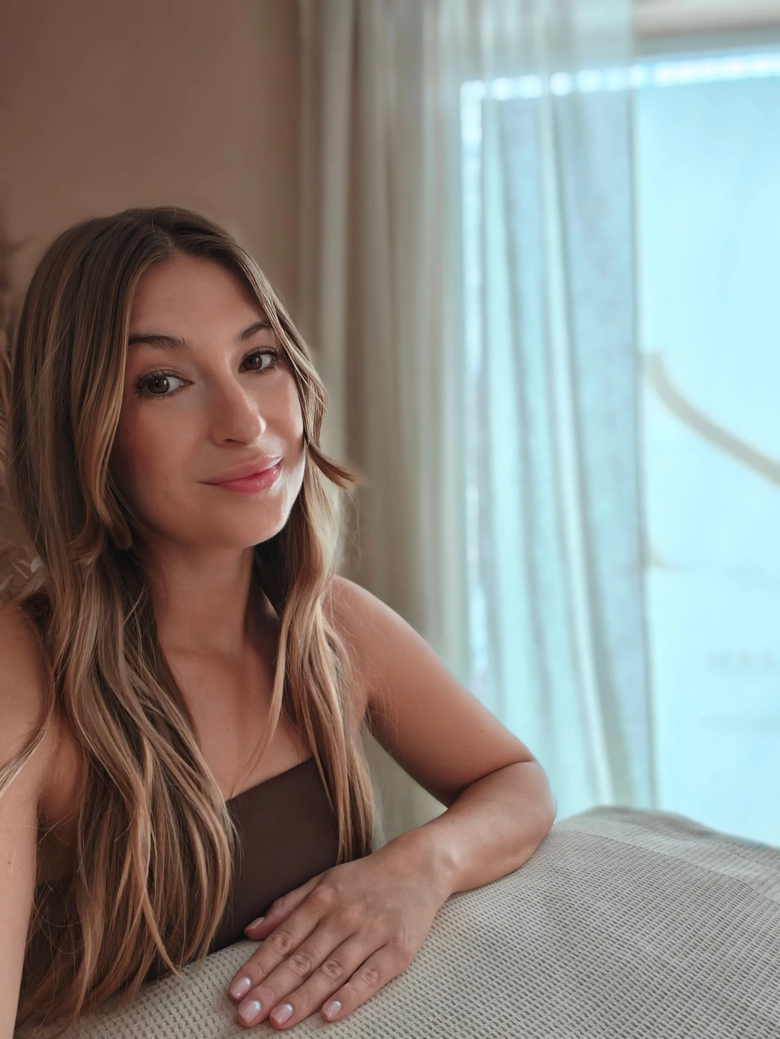 The founder of Naós Somatic Sanctuary in Kardamena, a certified specialist in Vagus nerve therapy and intuitive bodywork rituals.