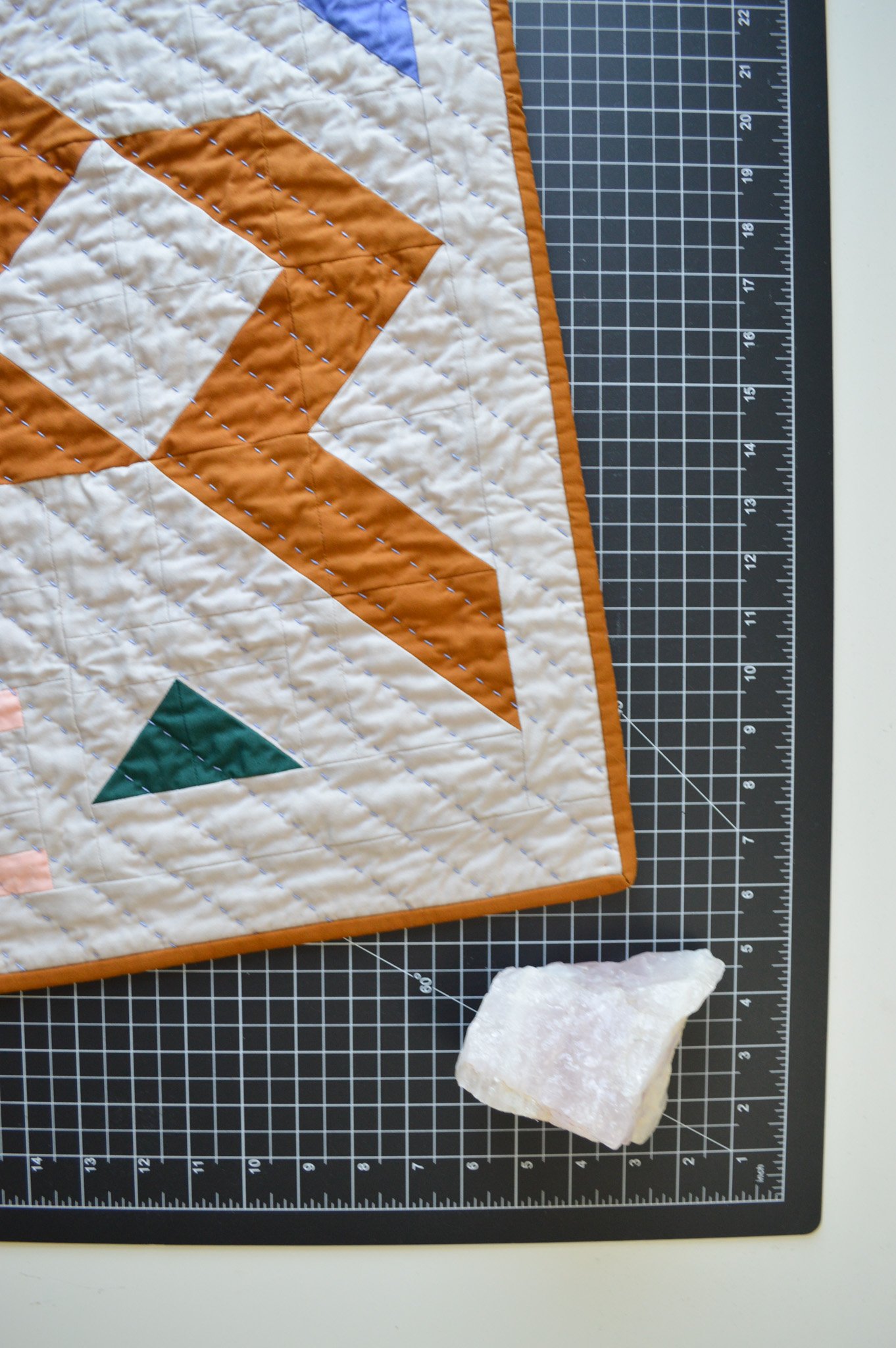  detail of hand quilting on a modern mini quilt 
