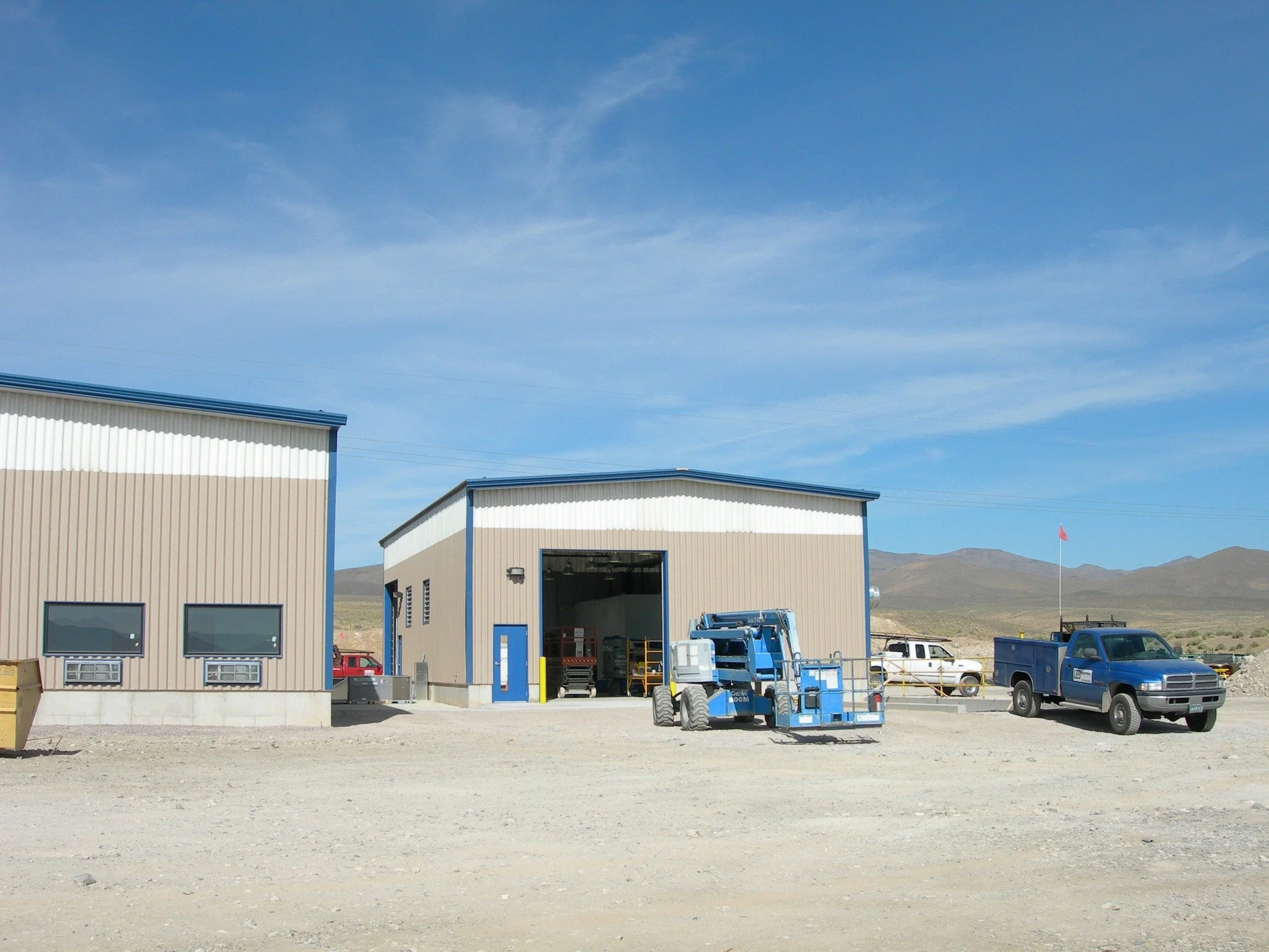 Mining doesn't wait for anyone.

That's why Nevada's mining operations trust us for support facilities, maintenance shops, and processing buildings that perform under pressure.
MSHA certified. Remote location experts. Built on mining time.

View some