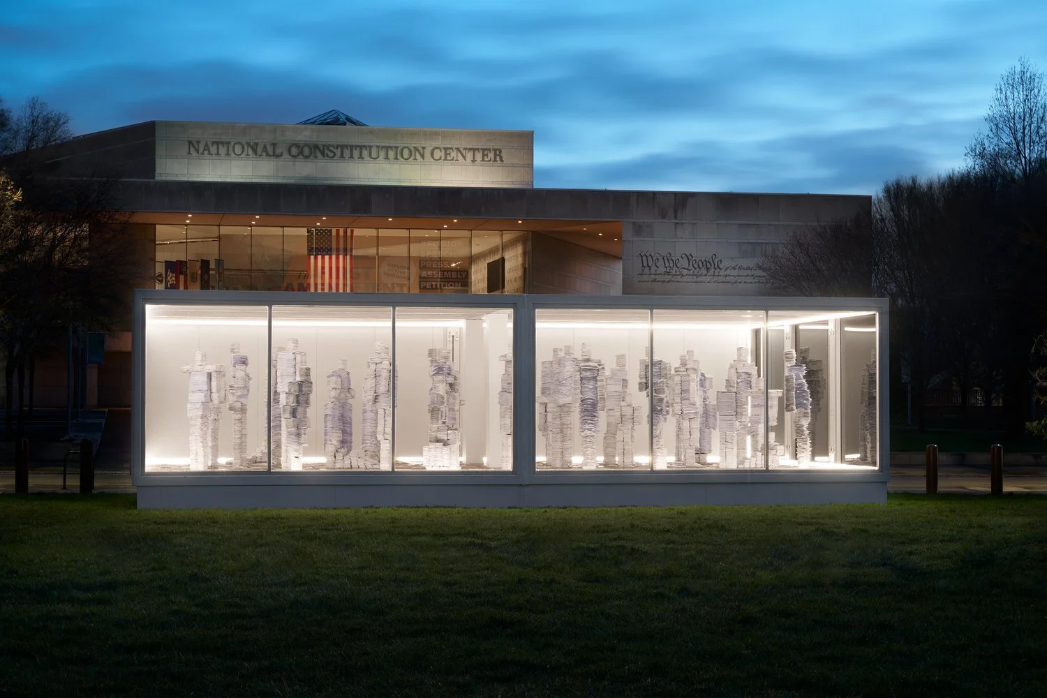 The "Waiting Workforce", an art installation out of real legal paperwork. 38 statues representing each state that has yet to enact Clean Slate legislation. Click to learn more.