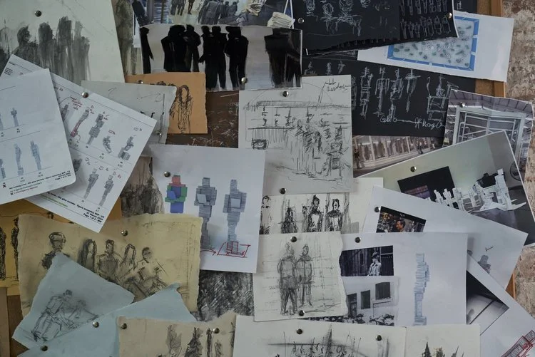The paperwork needed to clear their records keeps millions from supporting their families. We built statues out of that paperwork to bring the struggle to life.