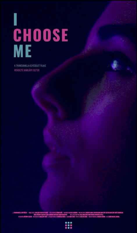 Close-up of a woman's face illuminated with purple lighting, with text reading "I CHOOSE ME" in pink and blue, and additional small text at the bottom.