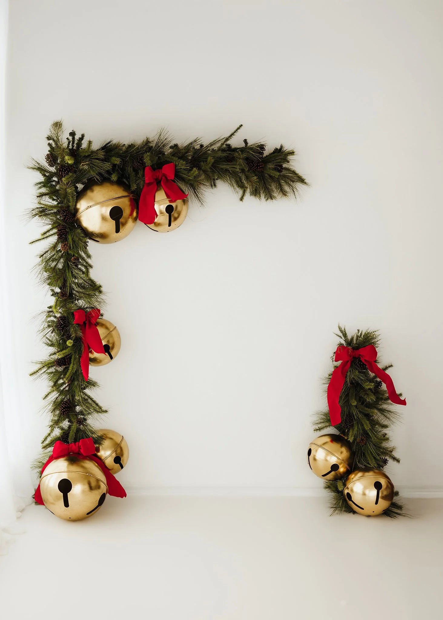 Christmas Mini Sessions Toledo Ohio in Studio 2026 gold bells.jpg