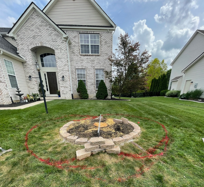 Front yard landscape before water feature installation, featuring an undeveloped lawn area in Indianapolis, IN.